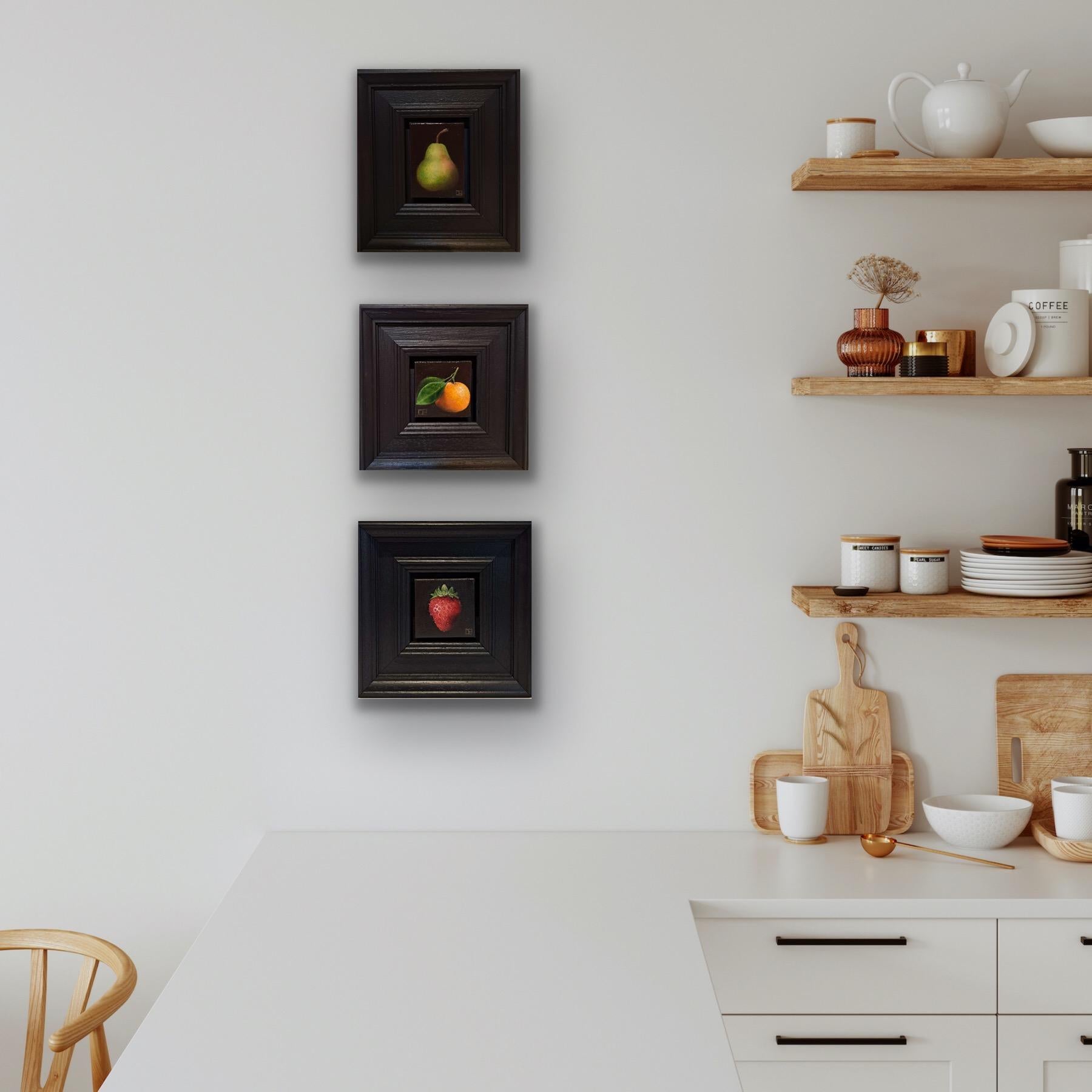 Pocket Bright Clementine is an original oil painting by Dani Humberstone as part of her Pocket Painting series featuring small scale realistic oil paintings, with a nod to baroque still life painting. The paintings are set in a black wood layered
