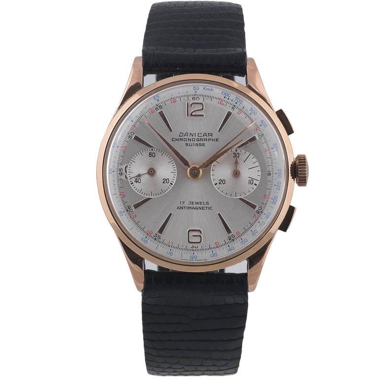 BERNARDO ANTICHITÀ PONTE VECCHIO FLORENCE
18Kt rose gold case, signed Danicar Chronographe Suisse, case n. 10, circa 1950

17-jewel antimagnetic manual wind movement, column wheel chronograph, silvered dial with 6 and 9 Arabic numerals, outer red