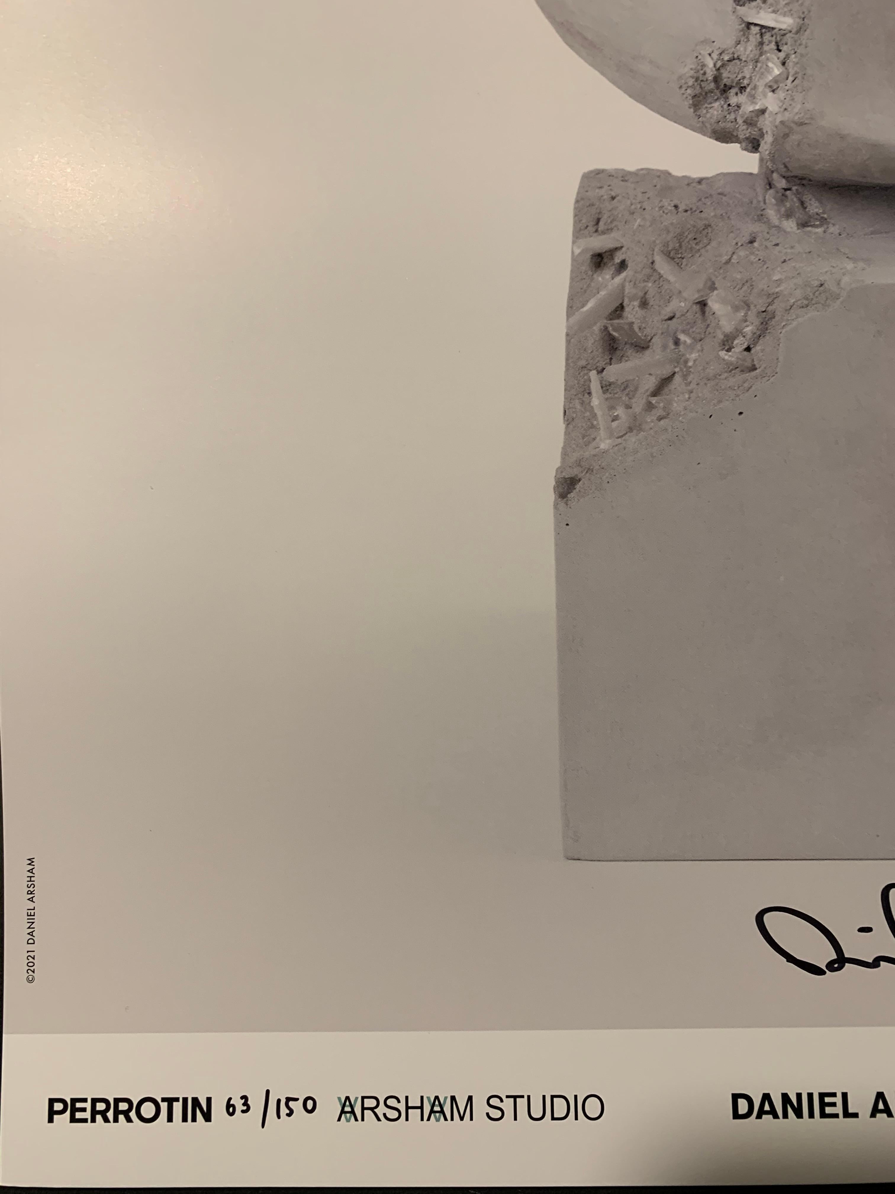 Signed and numbered by the artist in Black Sharpie Pen, Daniel Arsham.  Comes from a very small edition of only 150.