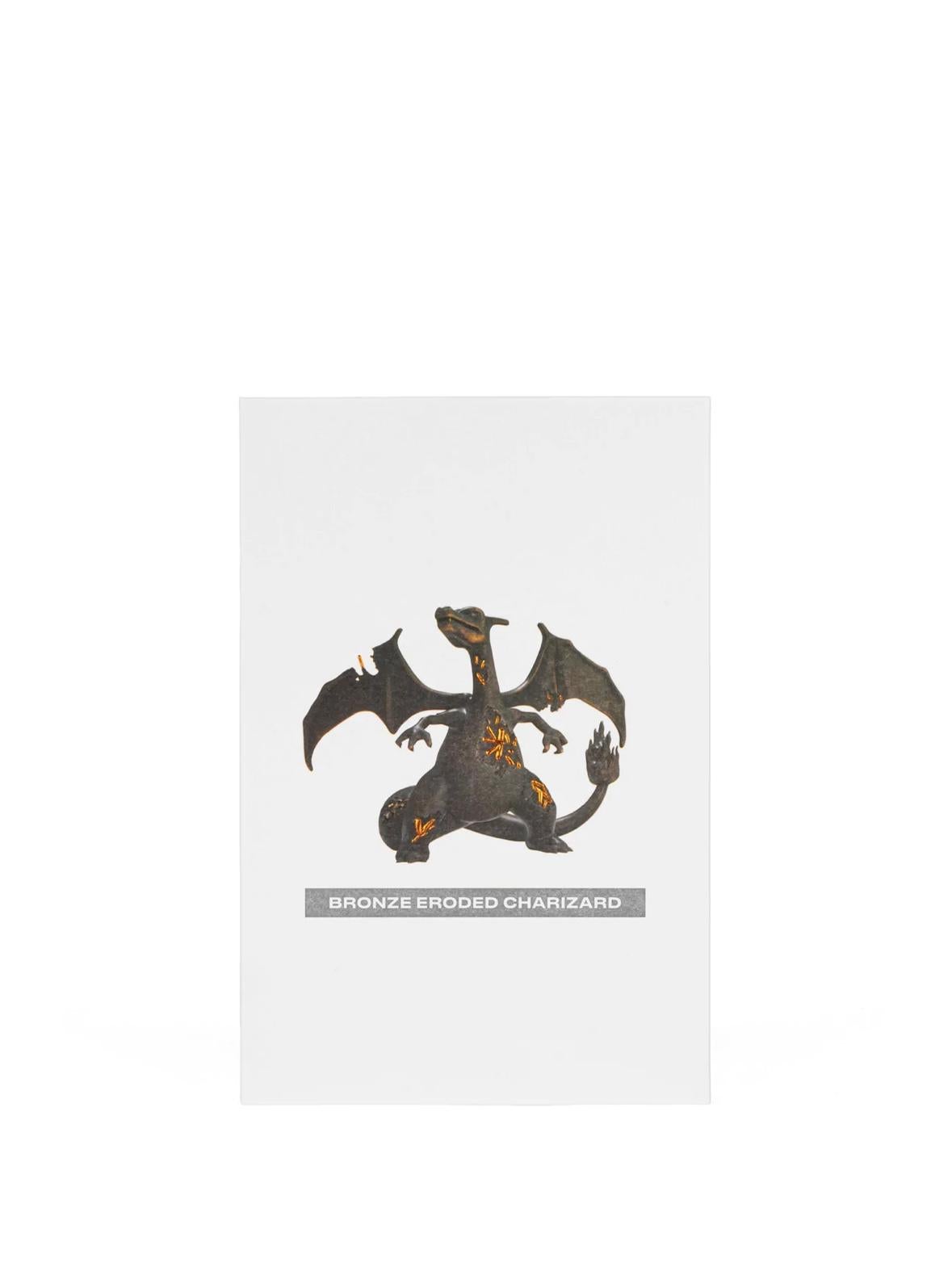 BRONZE CRYSTALIZED CHARIZARD is a sculpture that has been reimagined as a relic of Kanto uncovered through the passage of time. Made of cast bronze hand-finished with a custom black oil patina; Arsham's first time using this finish. The cast Bronze