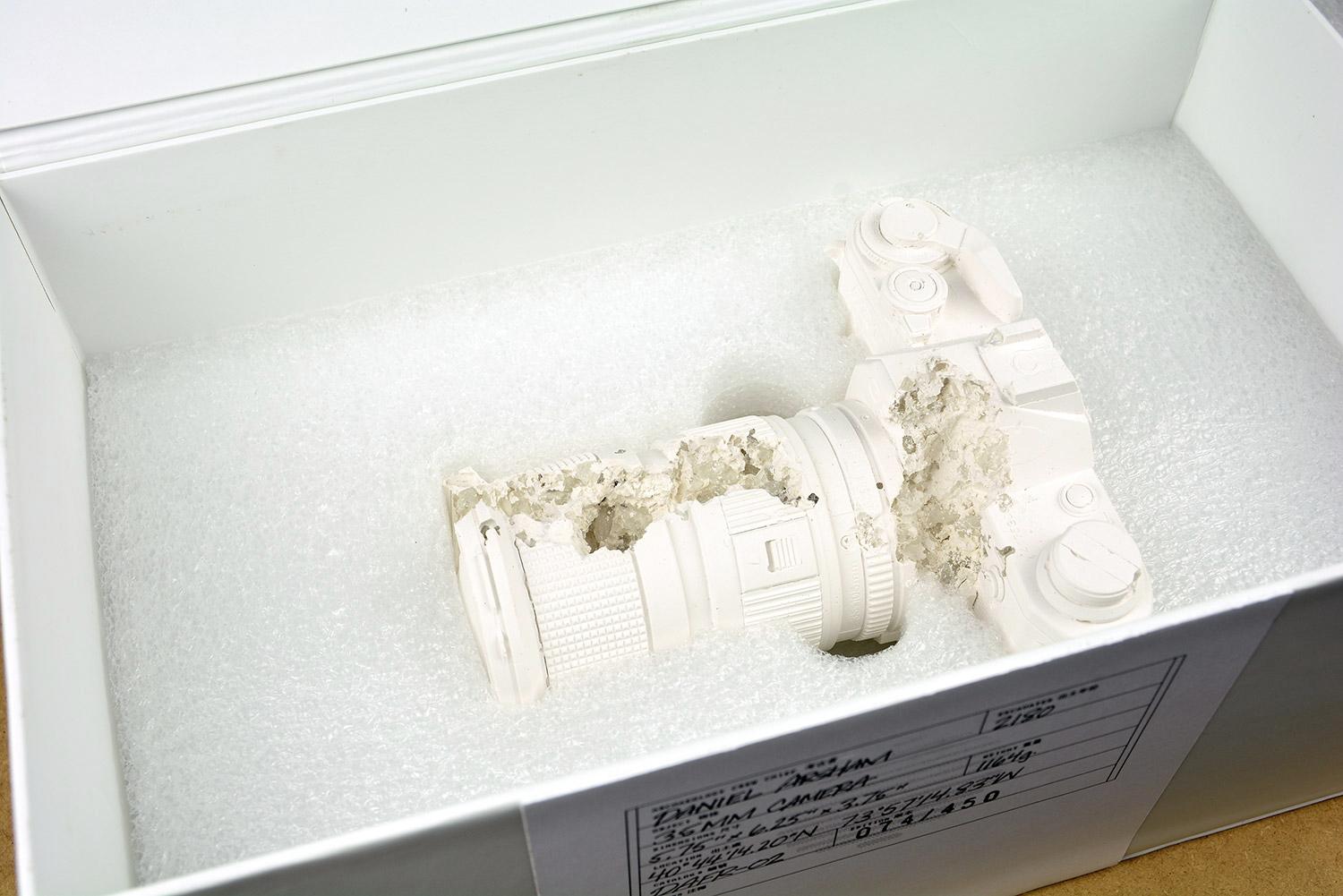 Daniel Arsham - FUTURE RELIC 02 - CANON AE1

Date of creation: 2014
Medium: Plaster and crushed glass
Edition number: 074/450
Size: 14.6 × 15.9 × 9.5 cm
Condition: In mint conditions, inside its original package. Never displayed, the box has only