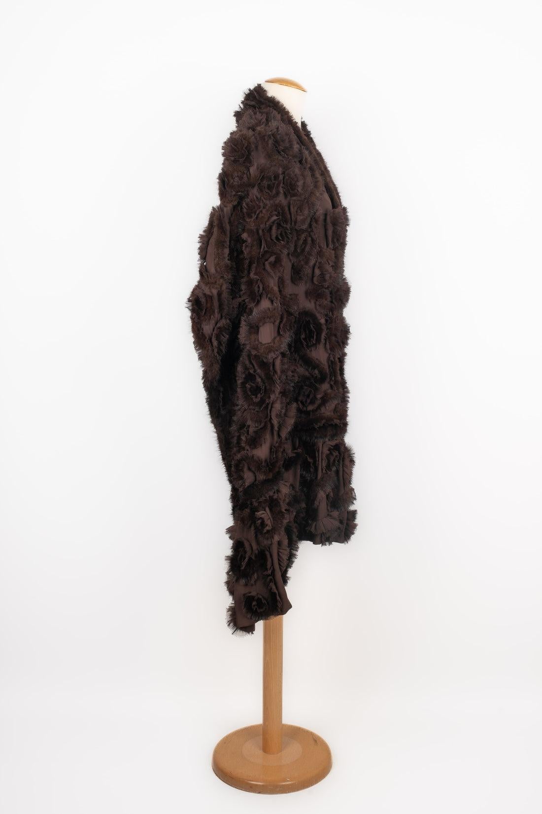 Daniel Benjamin - Large silk and mink stole in Daniel Benjamin's brown tones.

Additional information:
Condition: Very good condition
Dimensions: Length: 220 cm - Width: 54 cm

Seller Reference: ACC181