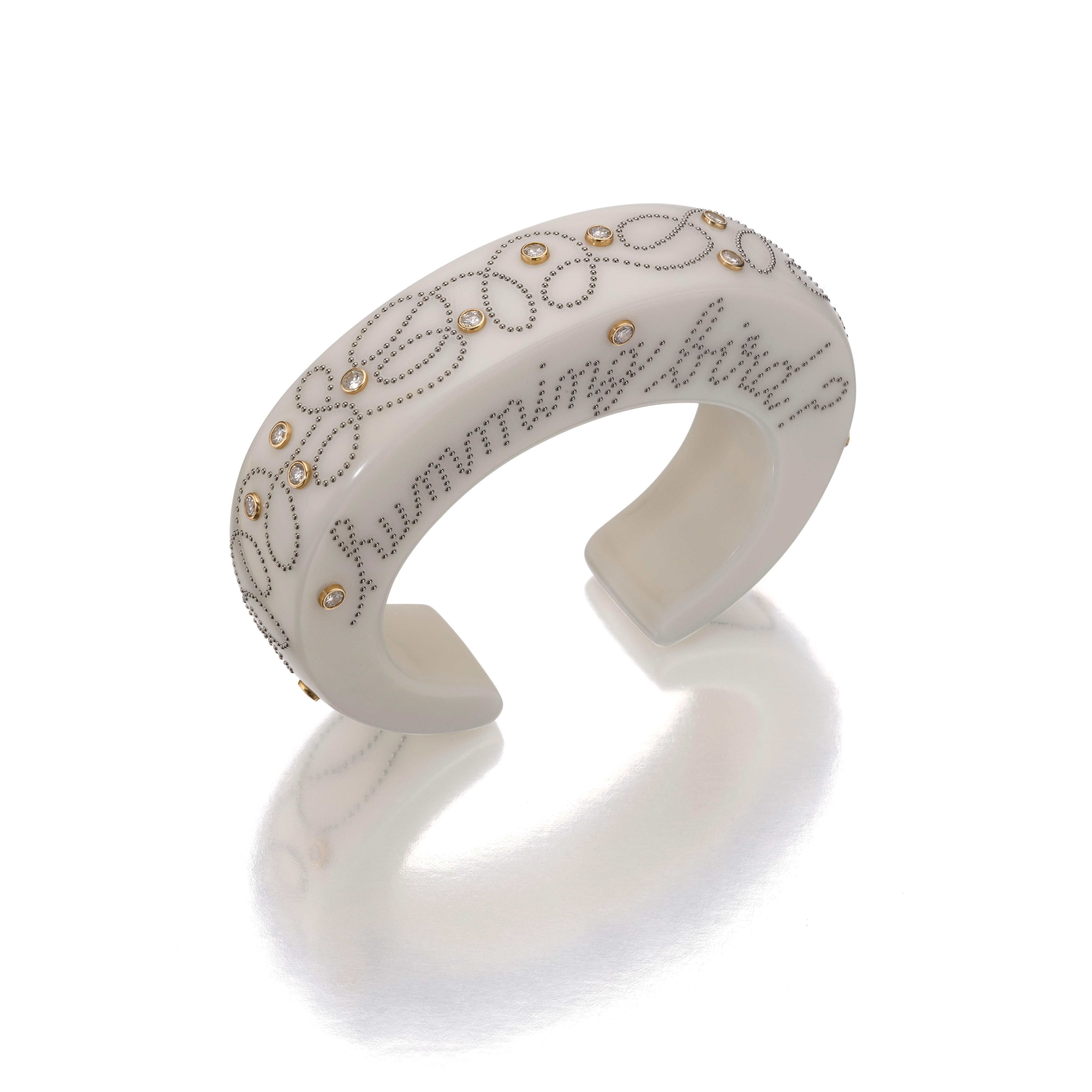 Bakelite, Steel, Gold, and Diamond Cuff Bracelet by Daniel Brush, New York, circa 2004

A carved, off-white Bakelite cuff ornamented with a granular steel inscription ”What’s the word, hummingbird?” and curling decoration, embellished with