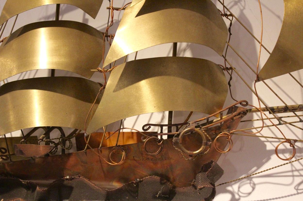 A very rare wall light sculpture in solid copper and brass, designed and made in the 1970s by the Belgium artist Daniel d’Haeseleer. This beautiful Sailing vessel comes with two light fittings for an even more beautiful effect. With nice patina and