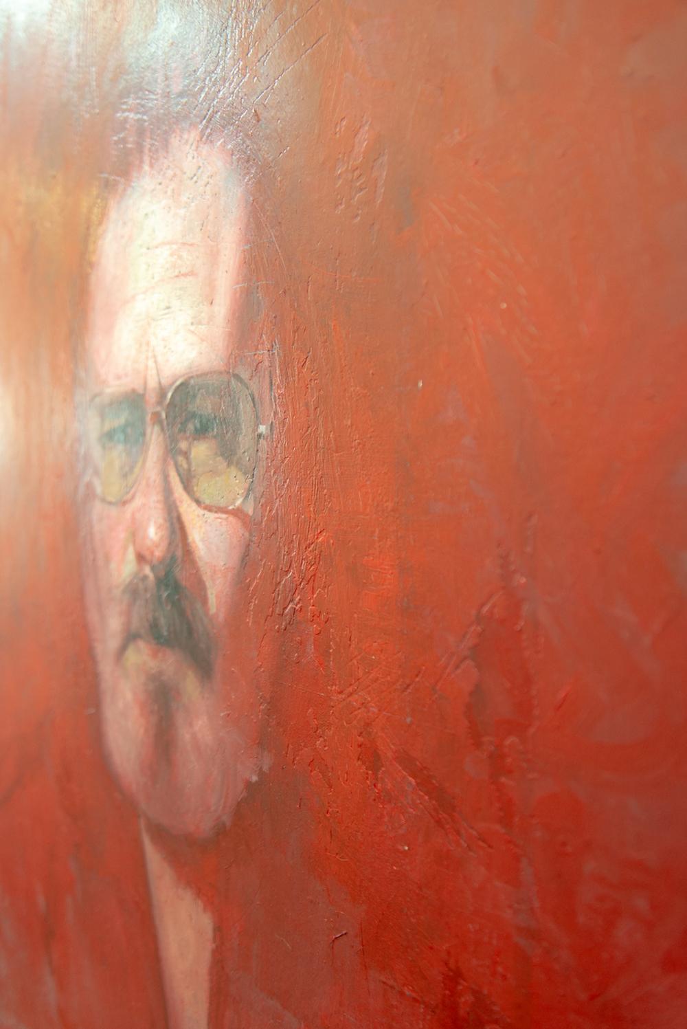 In this haunting self-portrait by Canadian realist Dan Hughes, the artist’s face seems to emerge from a rich red background. Hughes is known for his sensitive and engaging figurative work and expressive use of colour. Here, the artist is looking