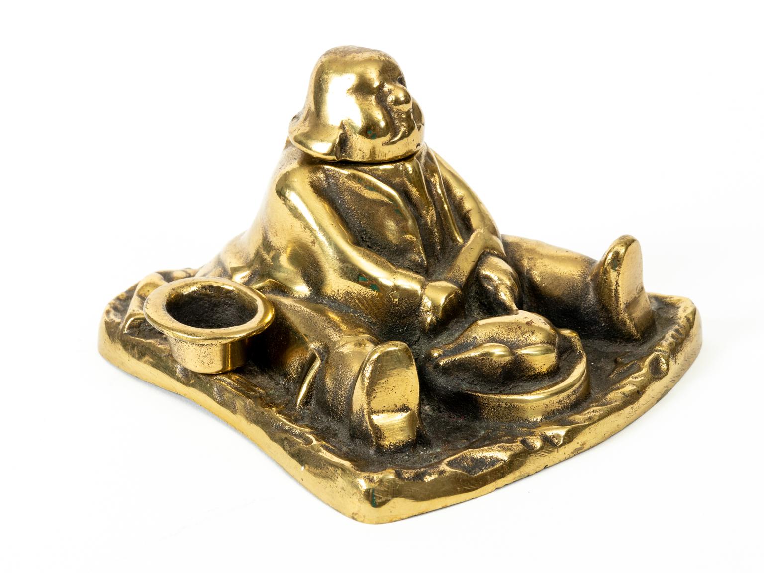 Vintage English brass figural inkwell depicting a seated Daniel Lambert holding a knife and fork with a plate of food in front of him. The piece was made in England during the first half of the 20th century. Please note wear consistent with age