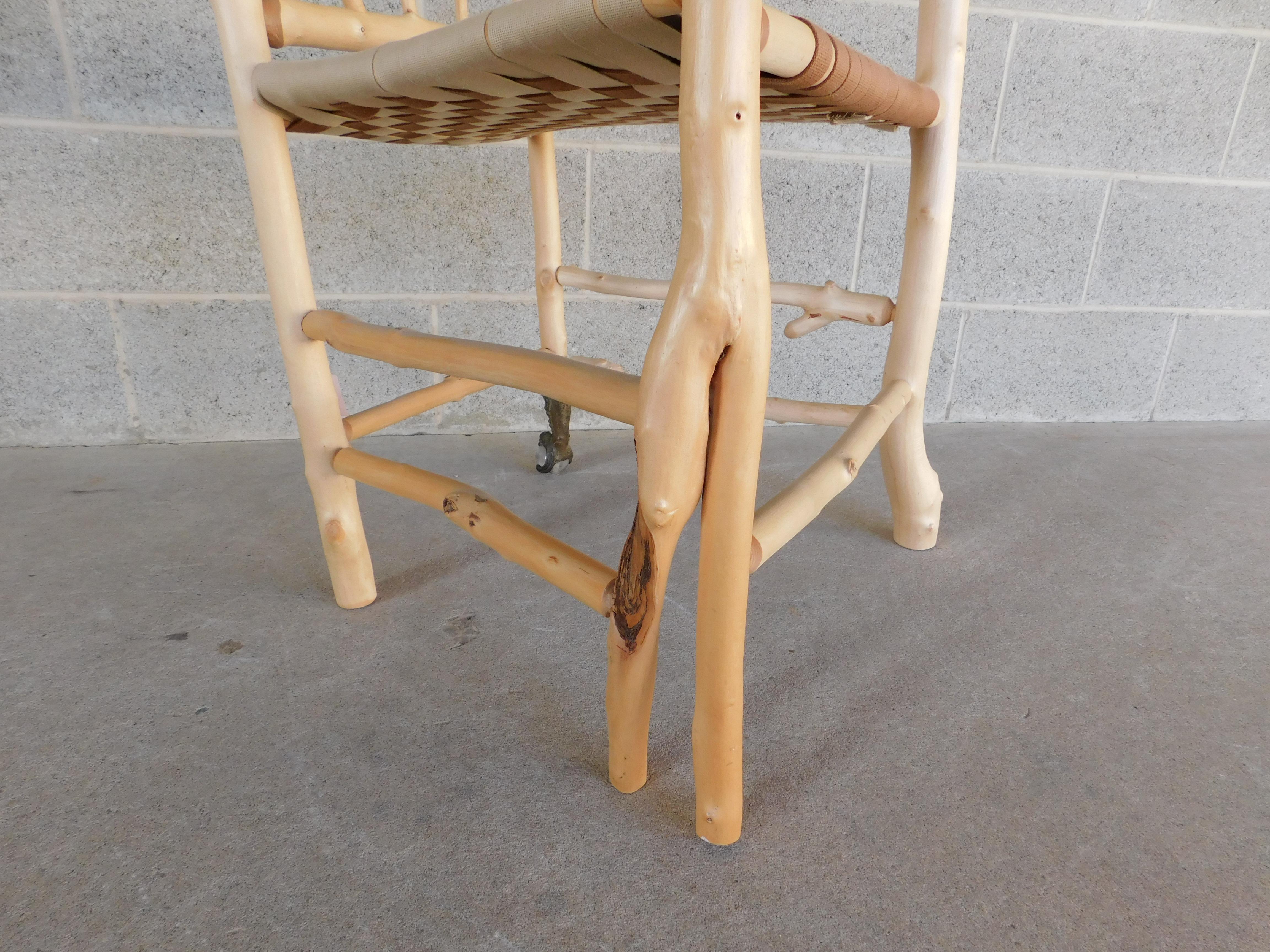 Daniel Mack Signed Stripped Bark Maple Stick Arm Chair

Folk Art - Adirondack Influenced - Stripped bark solid maple wood, hand rubbed natural finish. Independent uniquely crafted, with shaker style woven fabric seat.  Signed DM 