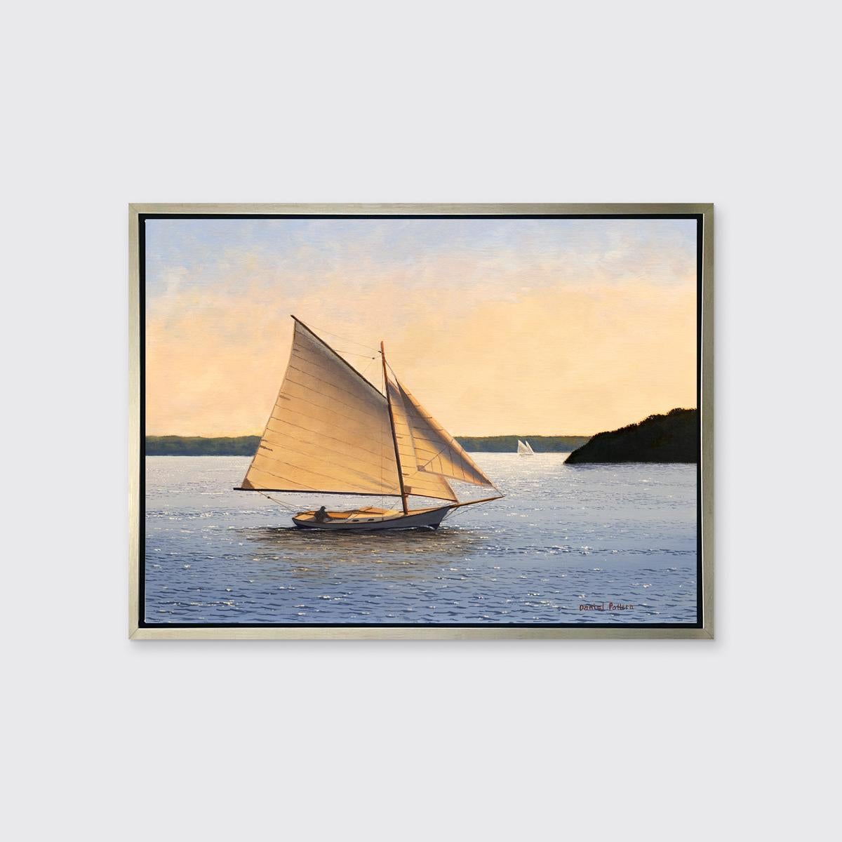 This coastal seascape Limited Edition giclee print by Daniel Pollera captures a sailboat at sunset. A single figure can be seen in the boat itself, navigating past a shadowed coastline covered in trees and foliage, with other white sailboats further