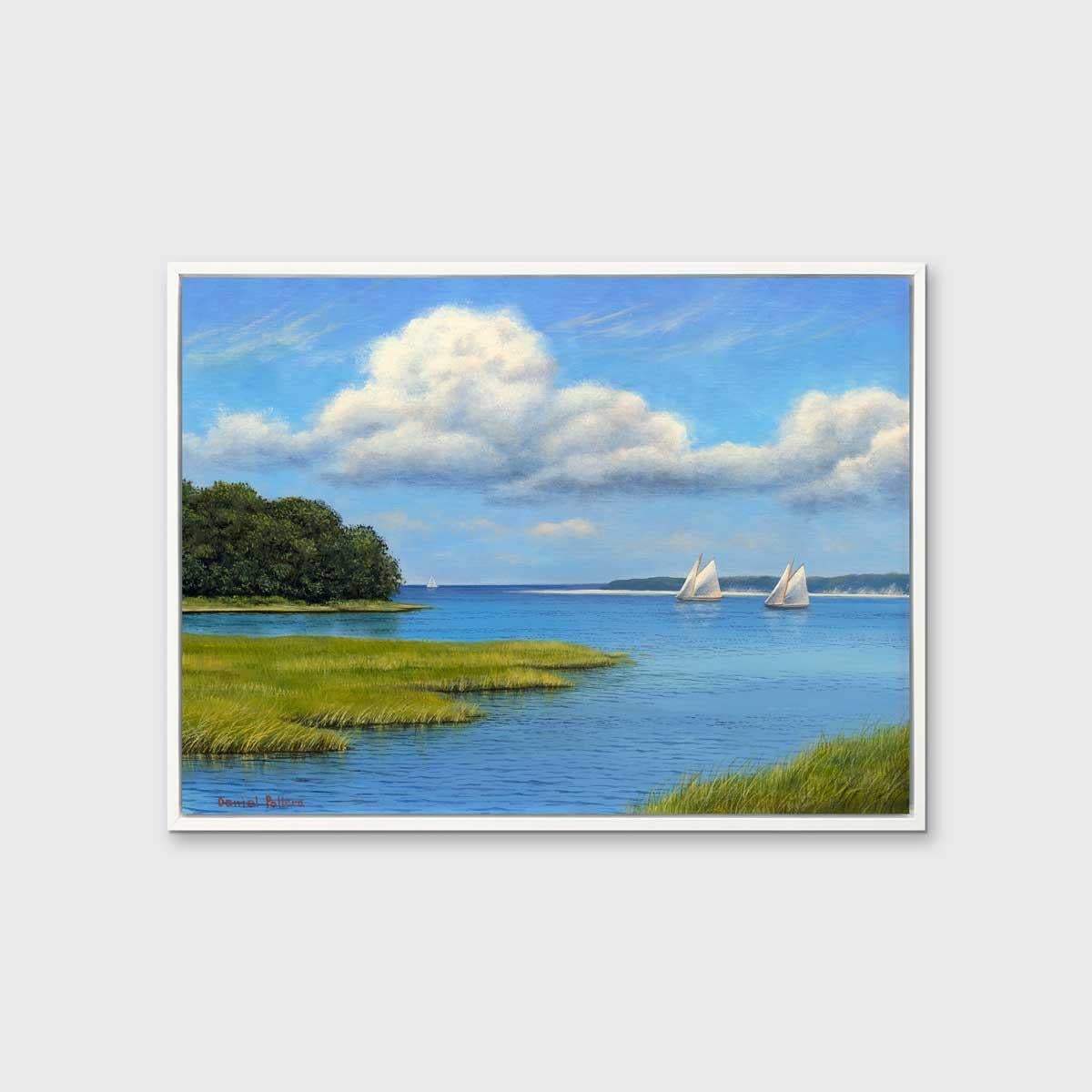 This traditional seascape Limited Edition print by Daniel Pollera captures a coastal summer scene with swaying grass in what appears to be a bay. Sailboats with white sails are visible along the horizon in bright blue water, which is mirrored by a