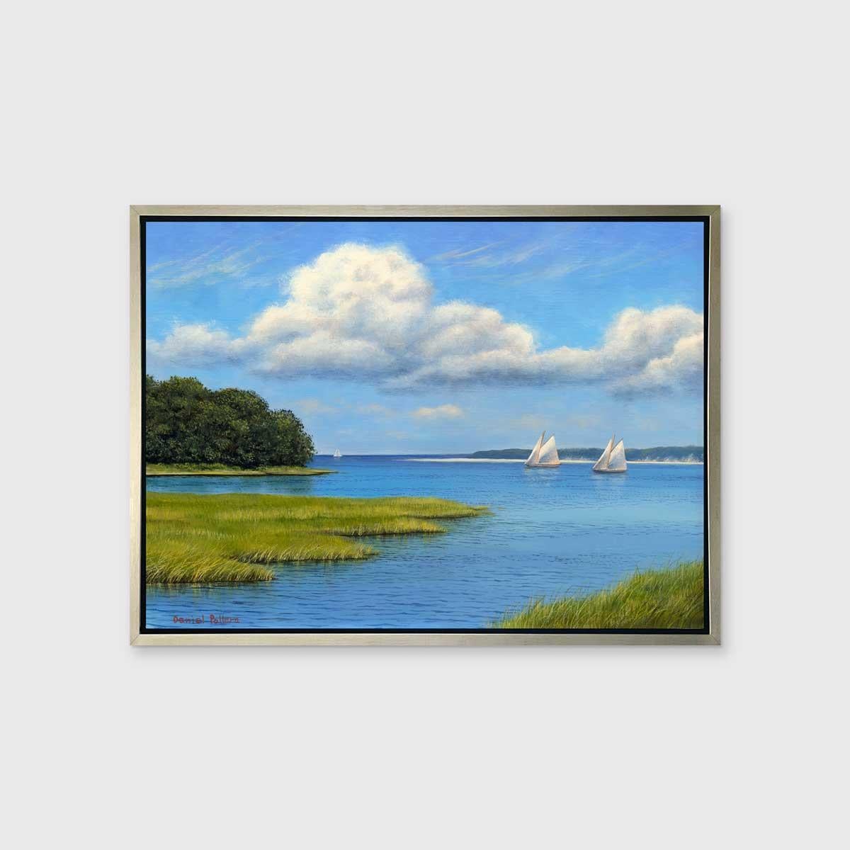This traditional seascape Limited Edition print by Daniel Pollera captures a coastal summer scene with swaying grass in what appears to be a bay. Sailboats with white sails are visible along the horizon in bright blue water, which is mirrored by a