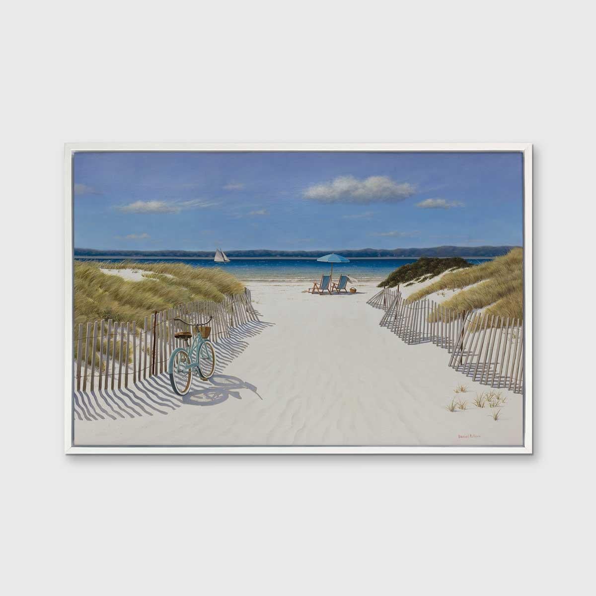 This coastal Limited Edition print by Daniel Pollera pictures a sandy walk with wooden fencing and grass on either side, leading to a beach. Two beach chairs and an umbrella overlook a vibrant, blue body of water, with hills on the horizon line,