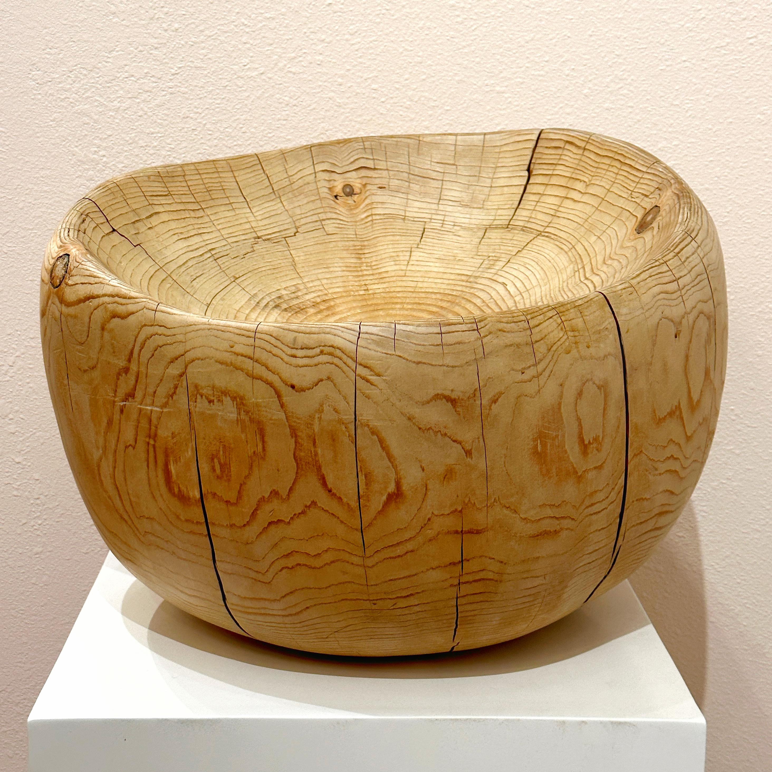 Daniel Pollock organic modern carved wood stool or sculptural object hand carved out of pine wood. This is a very heavy piece and the imperfections only add to its charm and appeal. A beautiful sculpture to place on a pedestal or use as a functional
