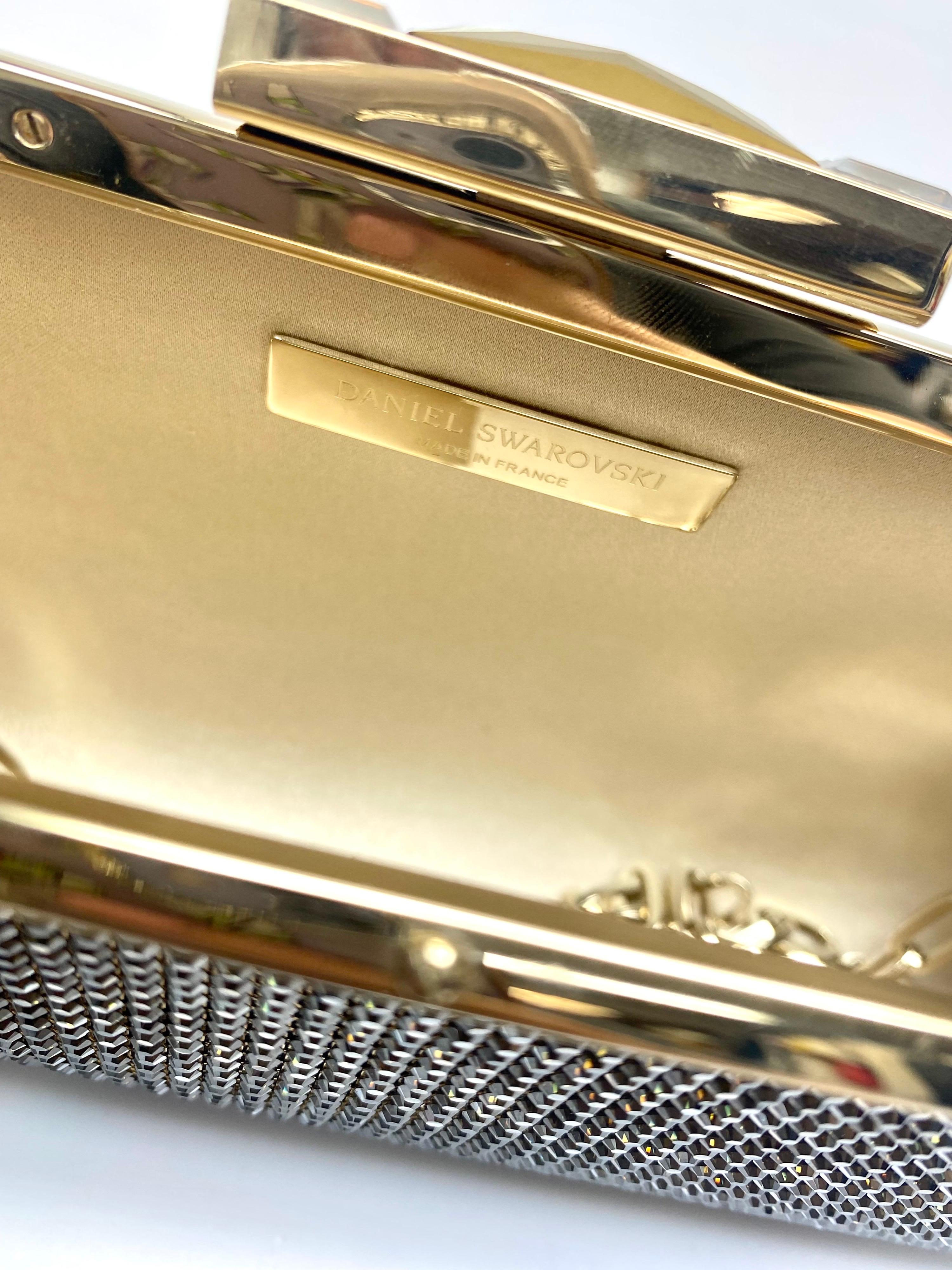 Daniel Swarovski Cartera de mano dorada con cadena 6