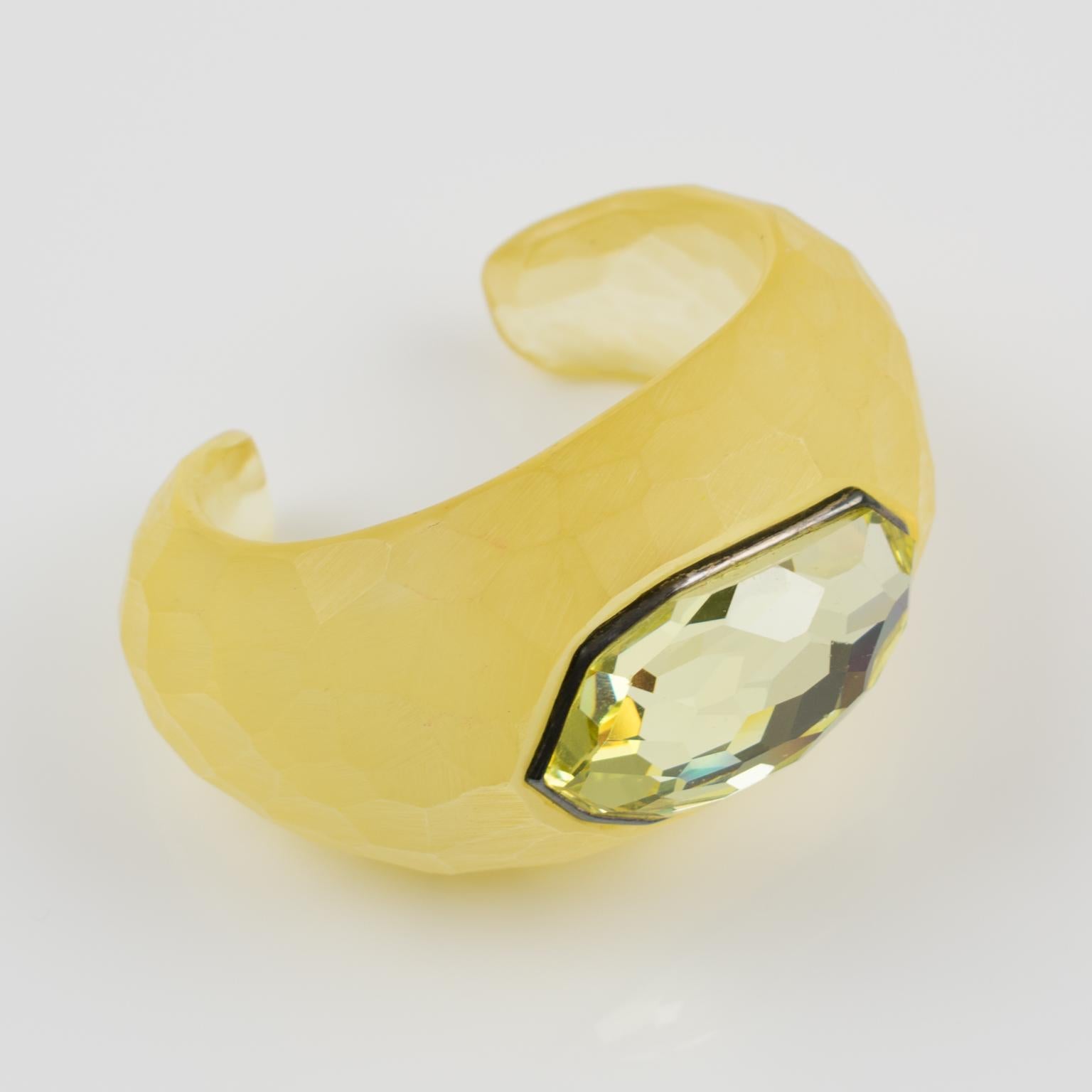 This stunning Daniel Swarovski Paris crystal-cut rhinestone on a Lucite cuff bracelet was designed by French artist Aline Gui. The piece features a bold yellow champagne color Lucite cuff shape with faceted carving and frosted finish aspect, topped
