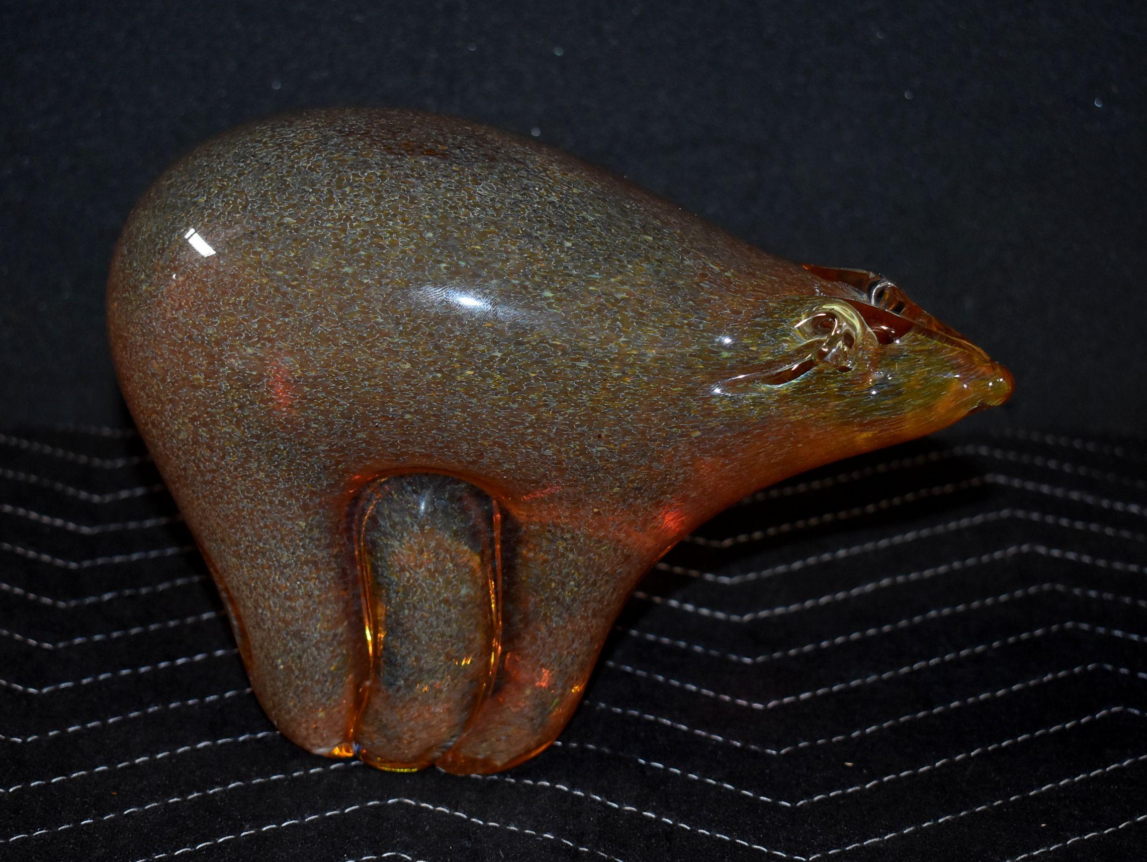 Bear is made with molten glass and is infused with iridescent strand. Vargas is originally from Mexico and is a master glassblower.
Daniel Vargas begun blowing glass at the age of eleven following in the footsteps of his father who taught him the