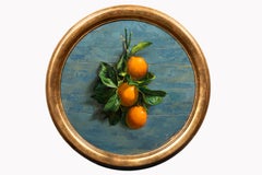 "Oranges #1" realistic still life painting, orange fruit with leaves