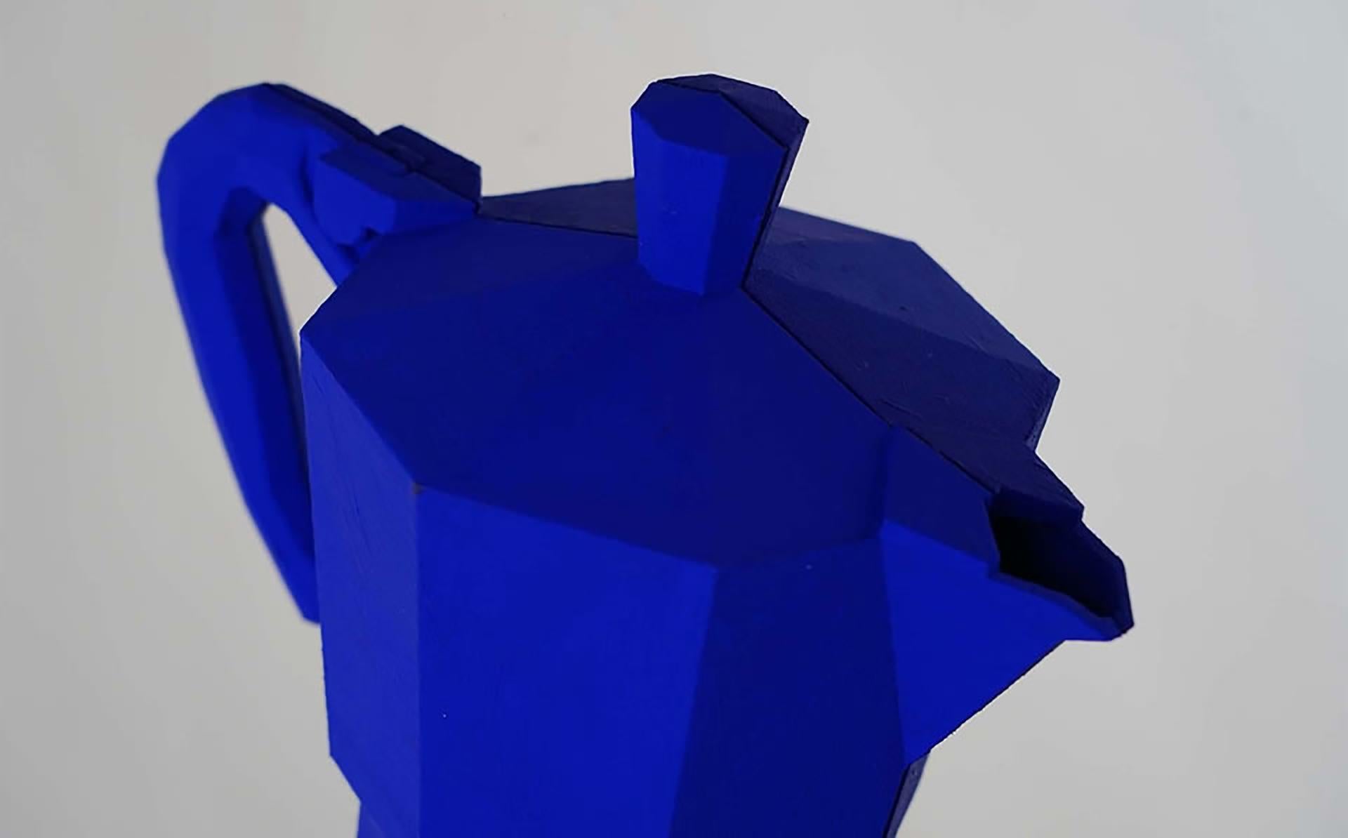 TITLE: Moka moi pas!
ARTIST: Daniele Basso
YEAR: 2022
MEDIUM TYPE: Sculpture
MEDIUM/MATERIALS: Blue resin and stainless steel mirror finish by hands
DIMENSIONS: 50 x 50 cm

Simple but brilliant. Unchanged over time. 
Moka is an icon of Italy. That