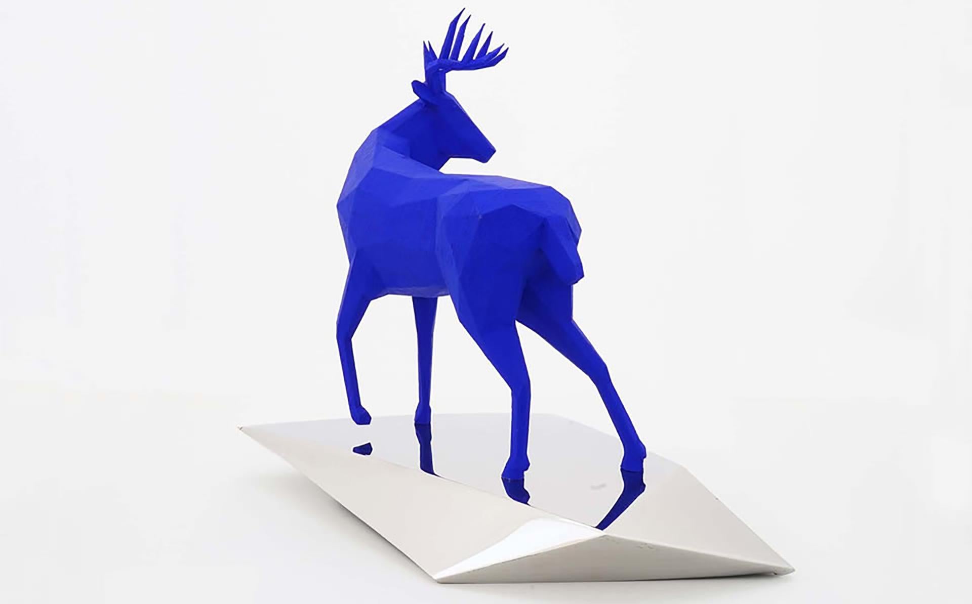 TITLE: Oops
ARTIST: Daniele Basso
YEAR: 2022
MEDIUM TYPE: Sculpture
MEDIUM/MATERIALS: Stainless steel mirror finished by hands and resin blue
DIMENSIONS: 32 x 18 x h 27 cm
WEIGHT: 3 kg

Surprisingly, behind a tree, the deer appears ... and we appear