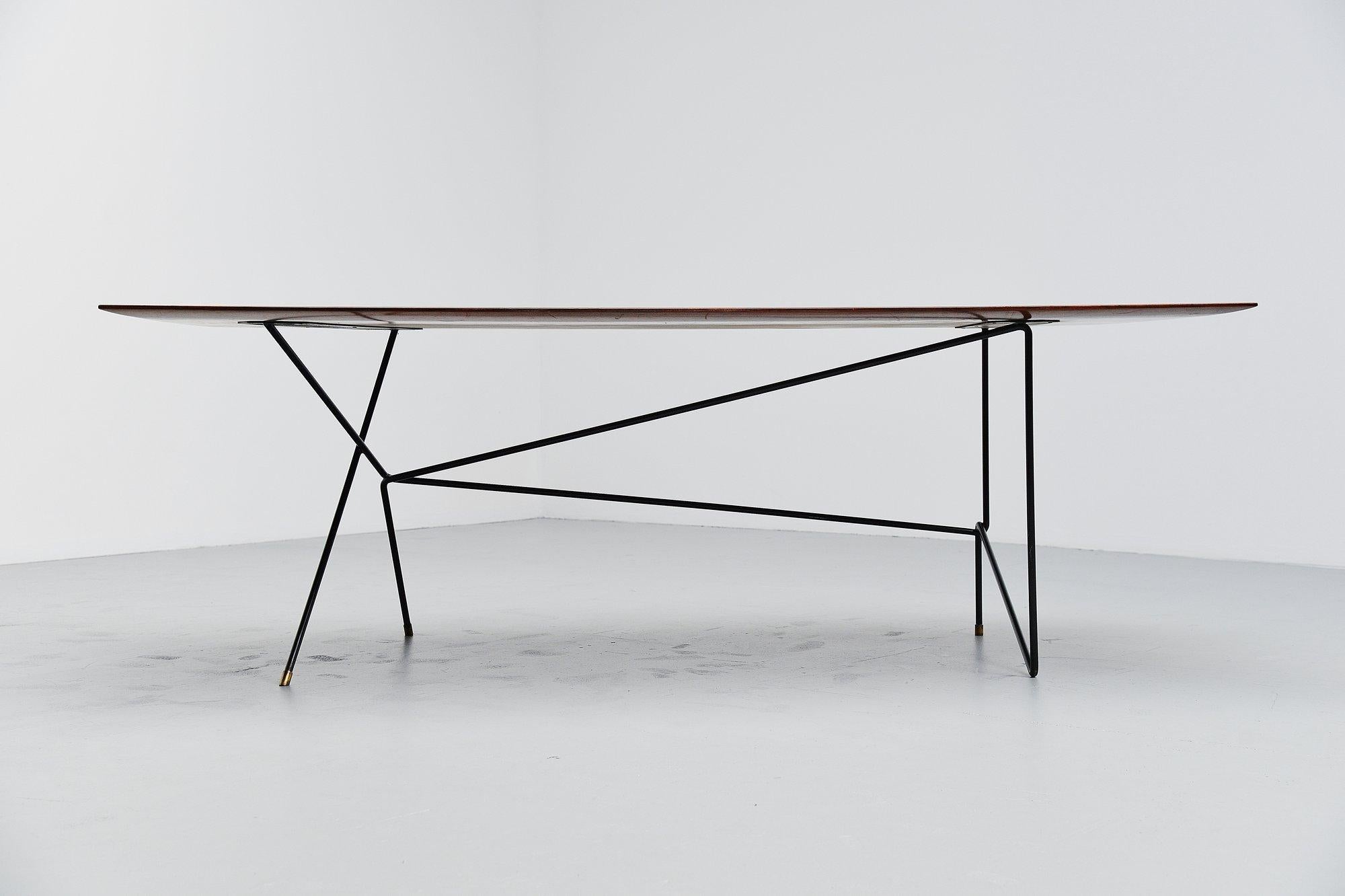 One off writing desk table designed and made by Italian architect Daniele Calabi, Italy 1950. This superb desk table was made by Daniele Calabi for his own use in 1950. This is a one of a kind table with spectacular a-symmetrical wire frame with