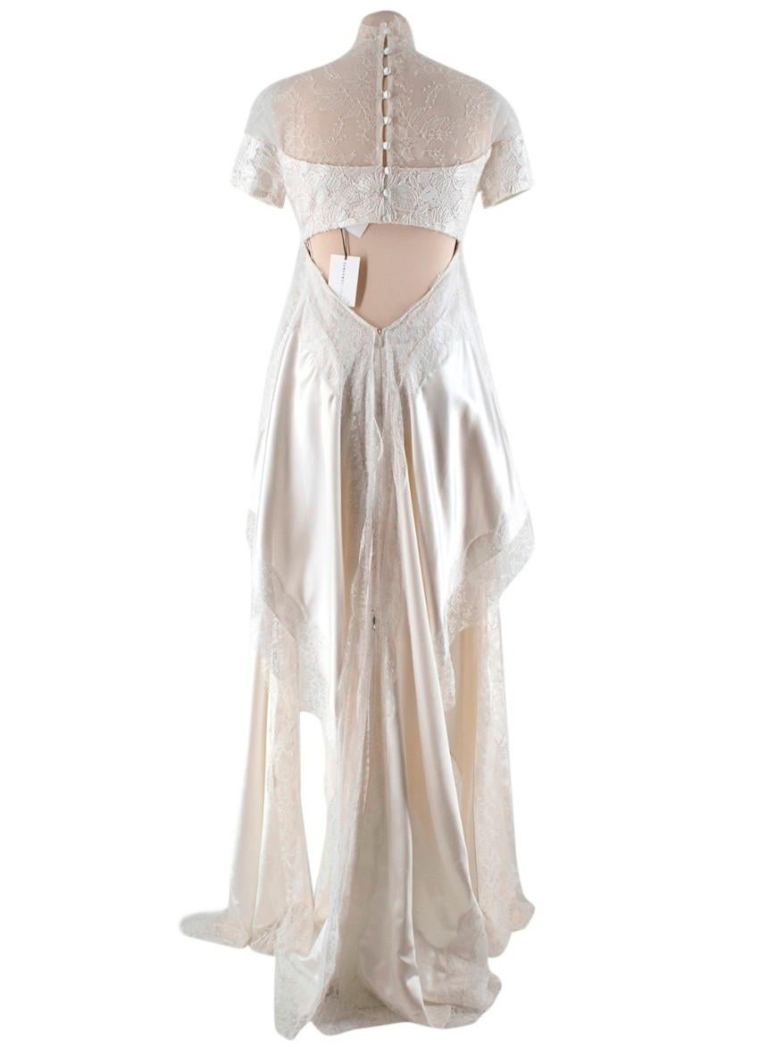 Danielle Frankel Elfenbeinfarbenes, spitzenbesetztes Julia's Kleid mit hohem Ausschnitt aus Seide

Danielle Hirsch studierte an der kultigen Parsons School of Design und  entwarf ursprünglich bei Vera Wang, bevor sie ihr Label Danielle Frankel