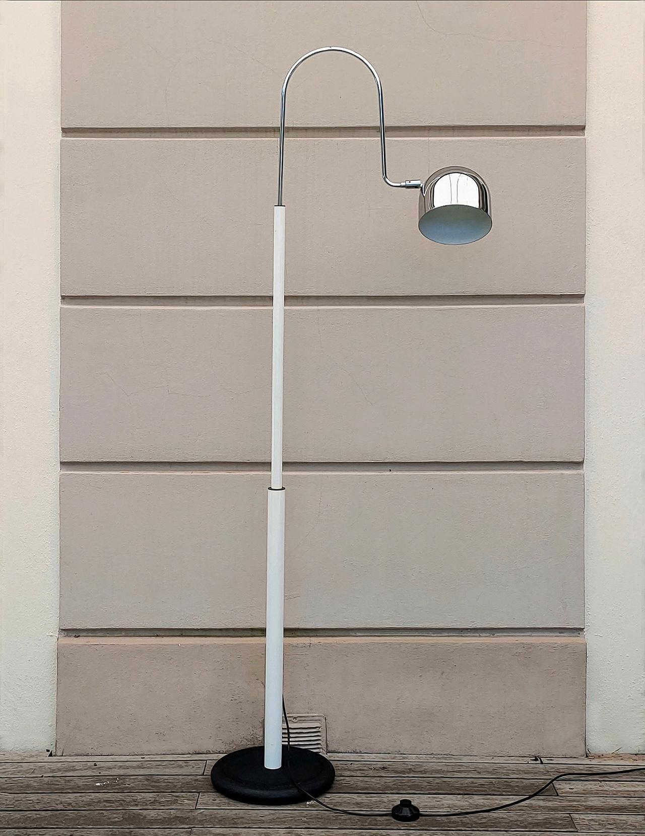 Floor lamp model Bridge was designed by the Aroldi brothers, Danilo and Corrado, in the early 1970s and produced by the famous Italian company Stilnovo.
The lampshade is in chromed metal fully swivel and directable in multiple ways, movable chrome