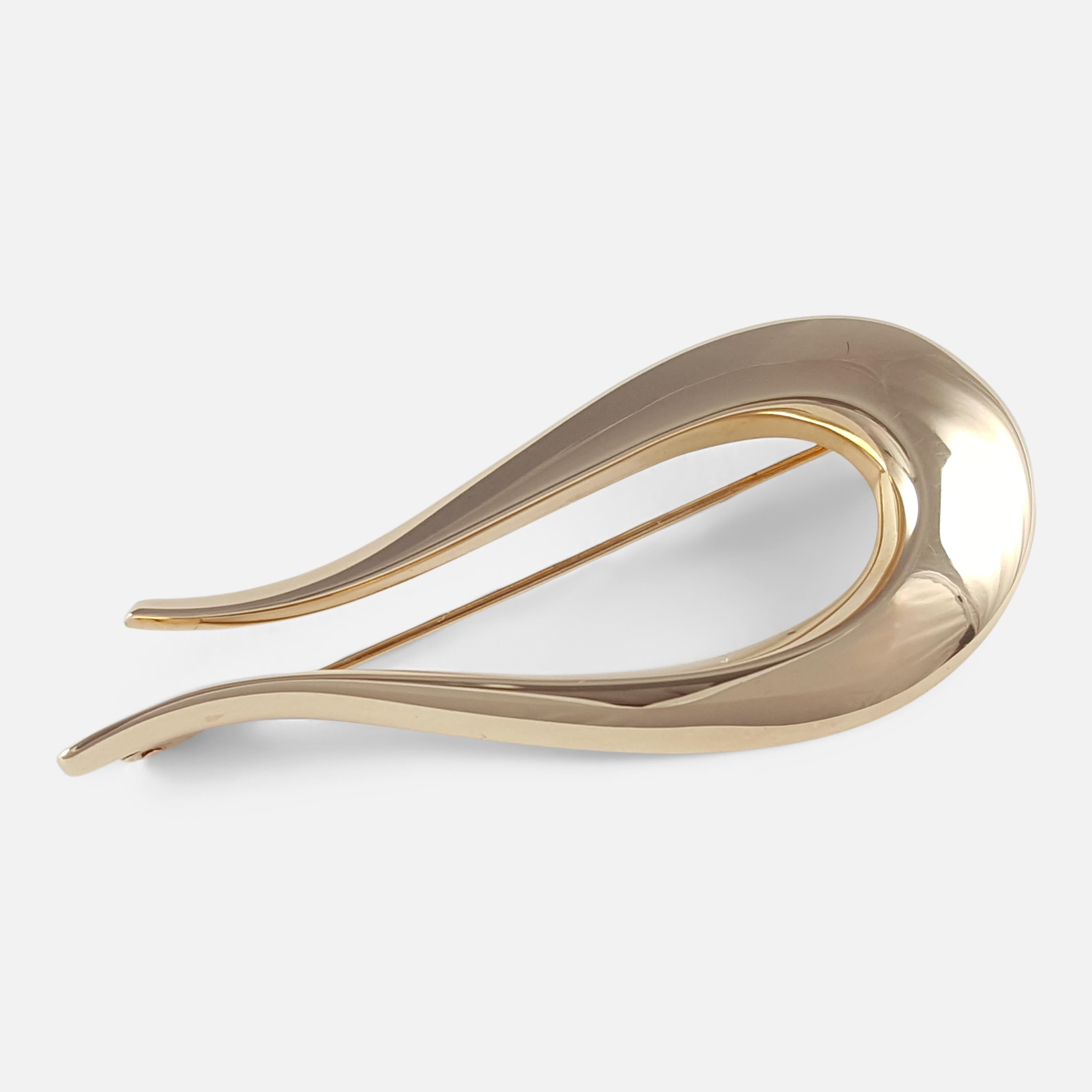 A 14 Karat yellow gold brooch, by Hans Hansen. 

The brooch is stamped 'Hans Hansen', '585', '104', & 'Denmark'. The brooch is UK hallmarked, stamped '585' to denote 14 karat (carat) gold.

Engraving: - None.

Measurement: - The brooch measures
