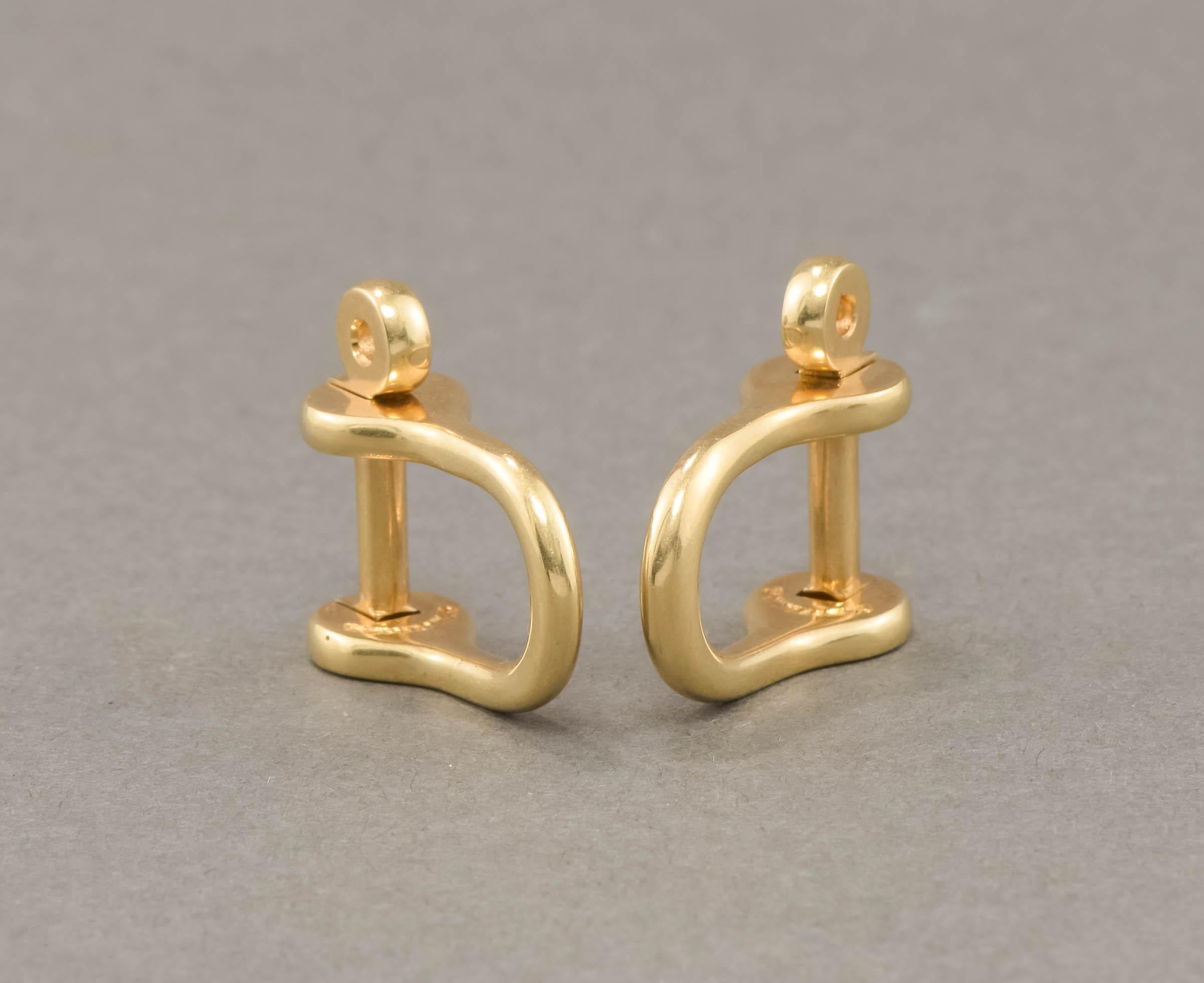 Offered is a wonderfully substantial and simply stylish pair of solid 14K gold cufflinks by Danish goldsmith, Ole Lyngguaard of Copenhagen.

Weighing a hefty 18.21 grams on my scale, these are elegant, hefty and high quality.  Both are marked for