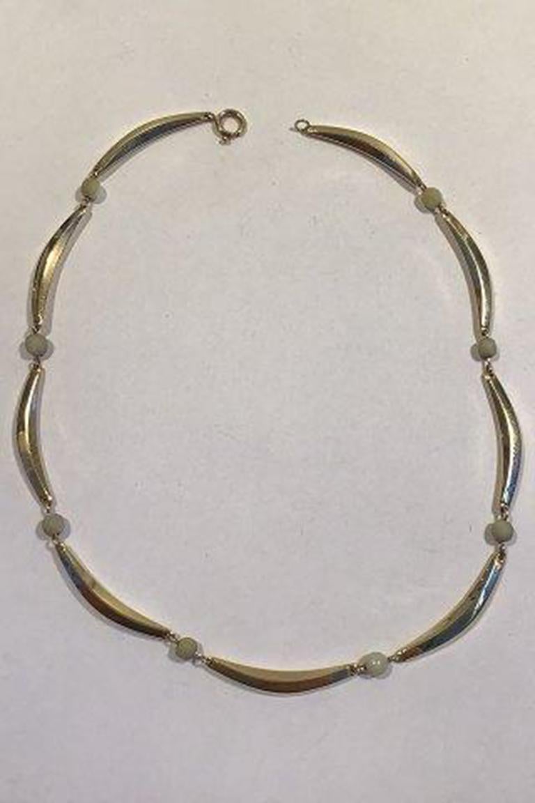 Dänische 14K Gold Halskette mit Perlen.

Maße 42,5 cm (16 47/64 in) Gewicht 18,4 gr/0,65 oz.
