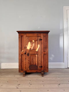 Danish 17th century Baroque, Folk Cabinet in patinated pine with Iron details