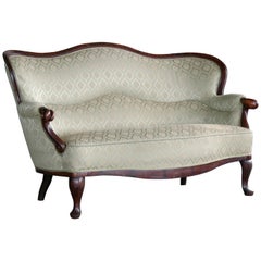 Canapé ou loveseat danois des années 1860 de style Revive Rococo en acajou sculpté