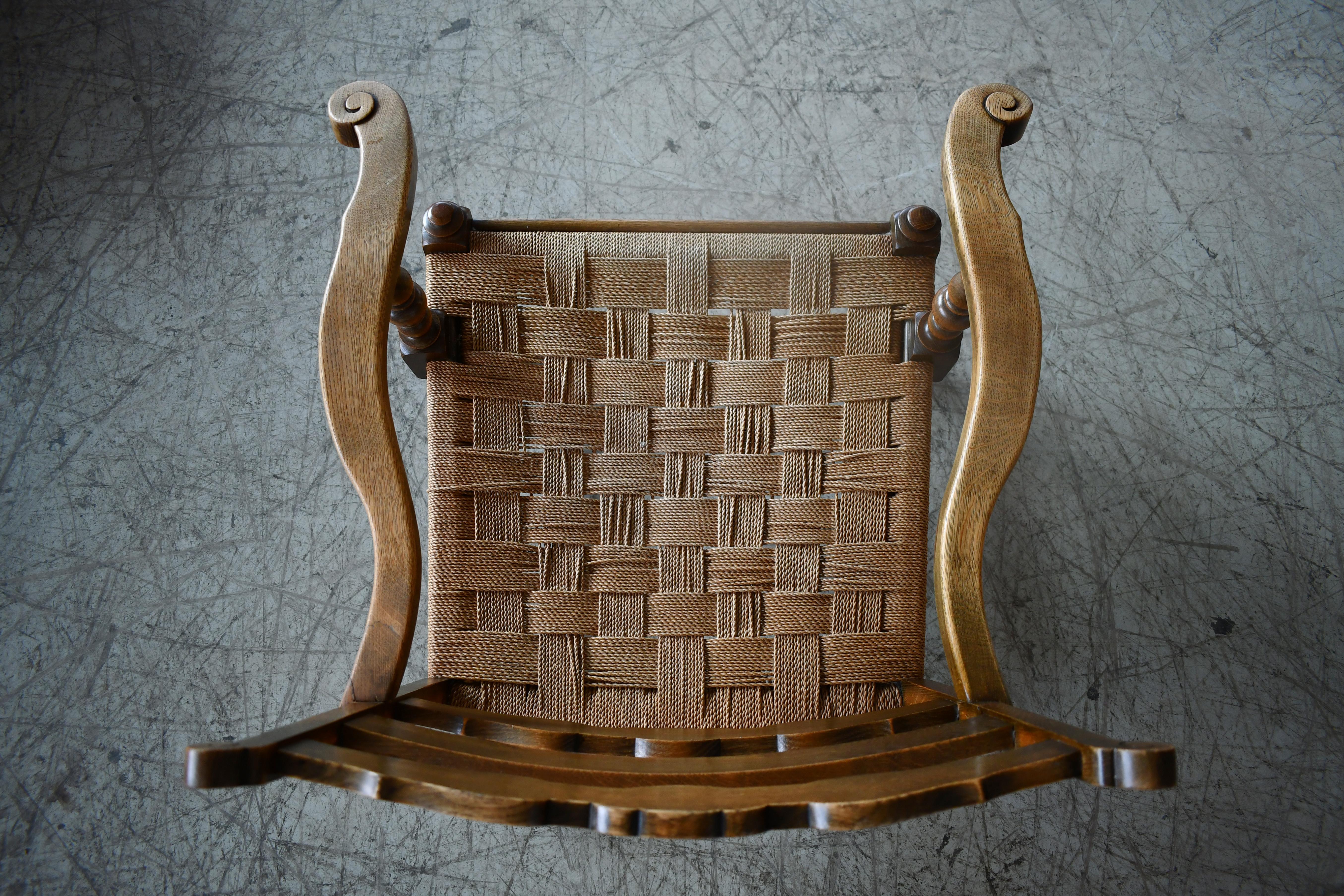 Mid-20th Century Danish 1930 or 1940s Carved Mahogany Armchair with Rush Seat For Sale