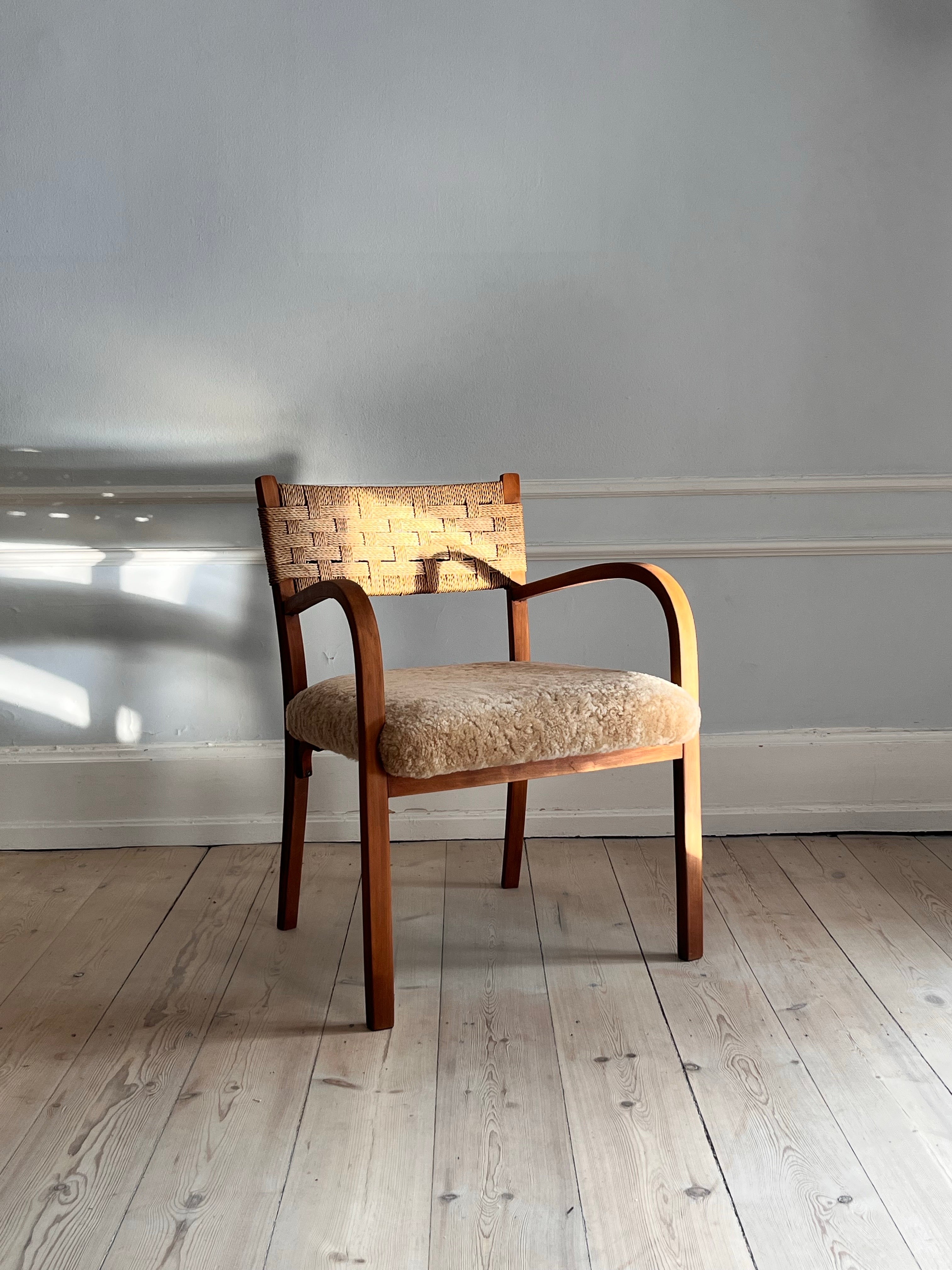 Mid-Century Modern Danish 1930s armchair with reupholstered seat i soft lambskin For Sale