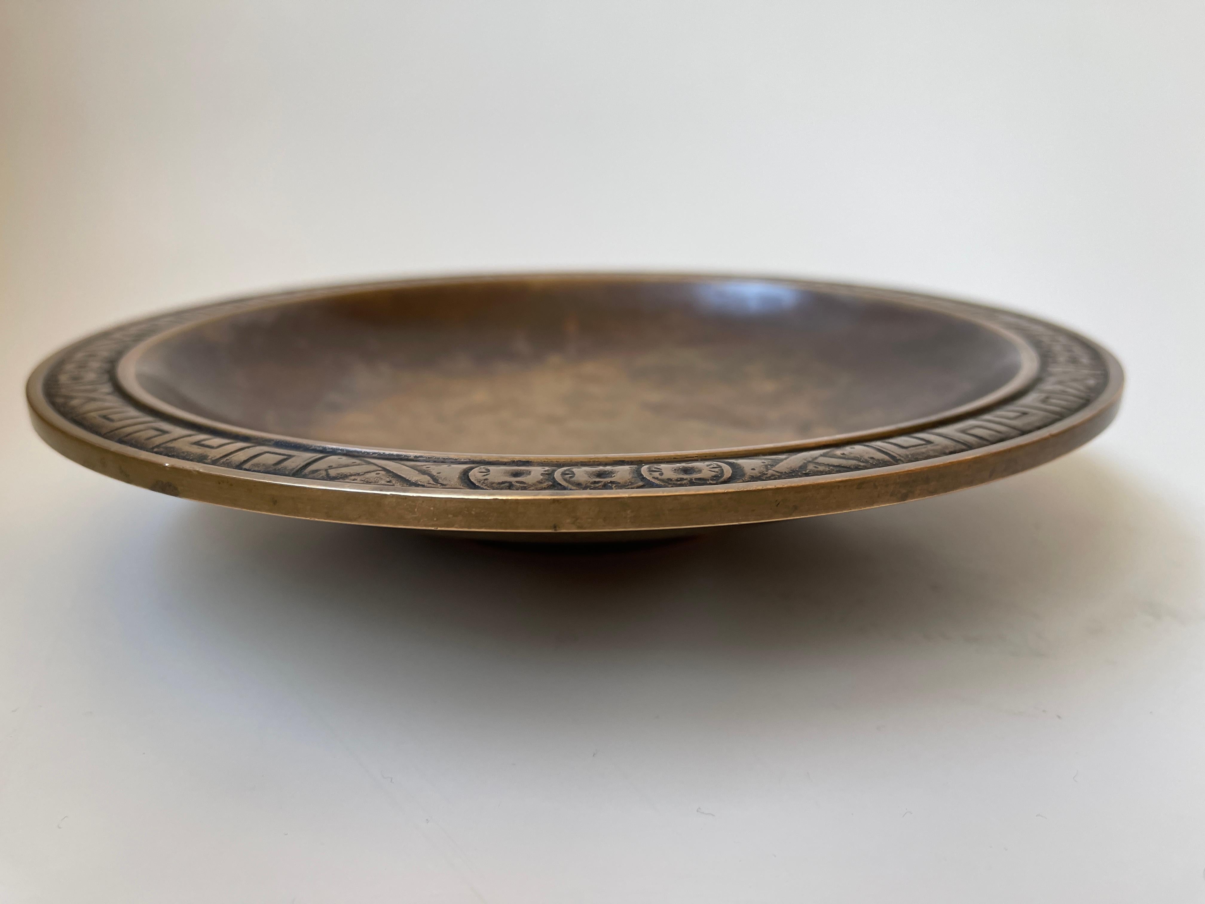 Danish Art Deco patinated bronze centrepiece bowl with low pedestal base.
Engraved rim with ancient Scandinavian symbols. Denmark, c.1930's.