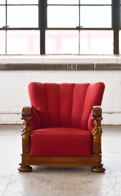 Danish 1930s Large Scale Club or Chair with Figurines Carved into Oak Armrests