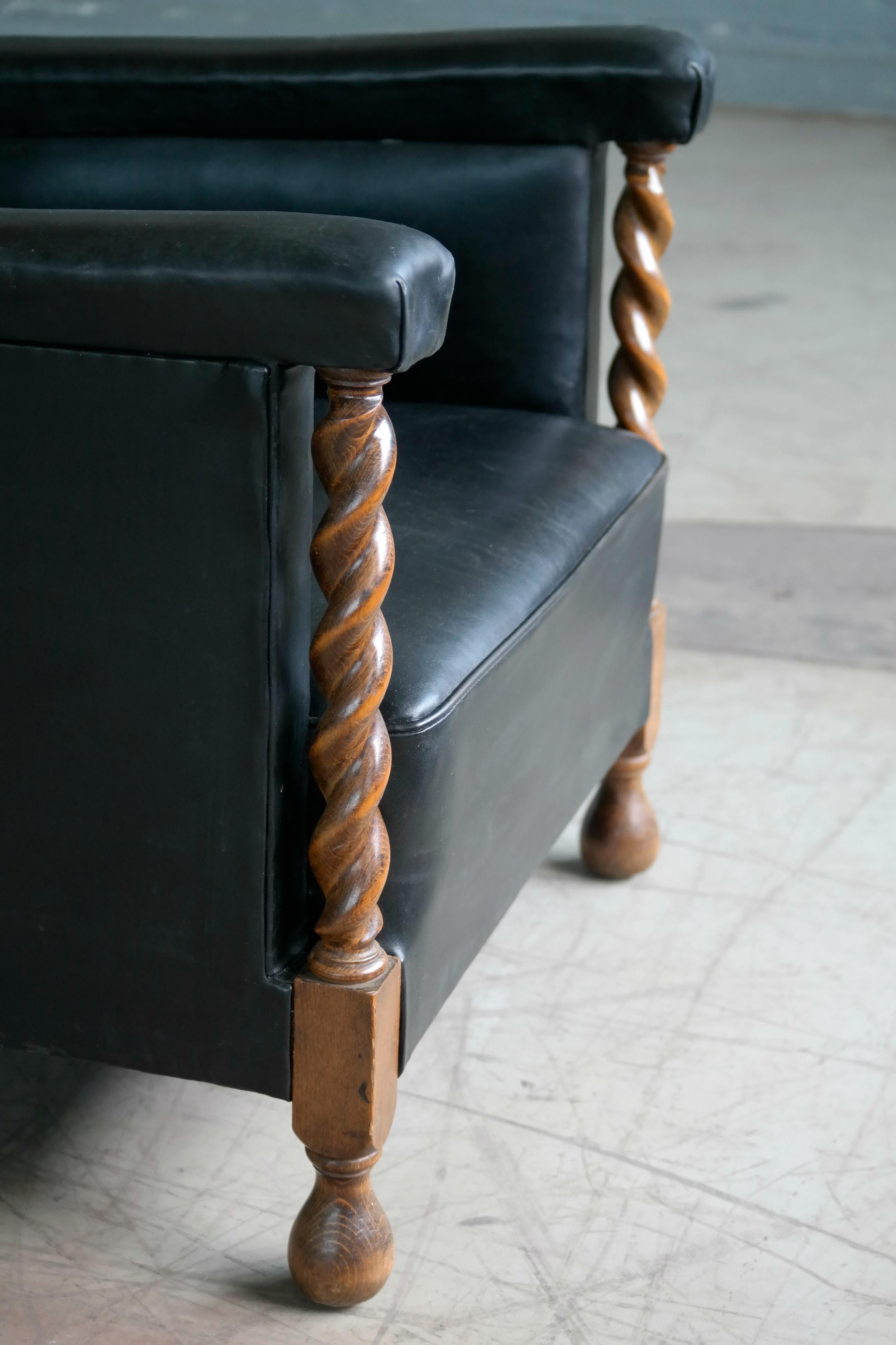 Danish 1930s Large Scale Club or Wingback Chair in Black Leather and Carved Oak 3