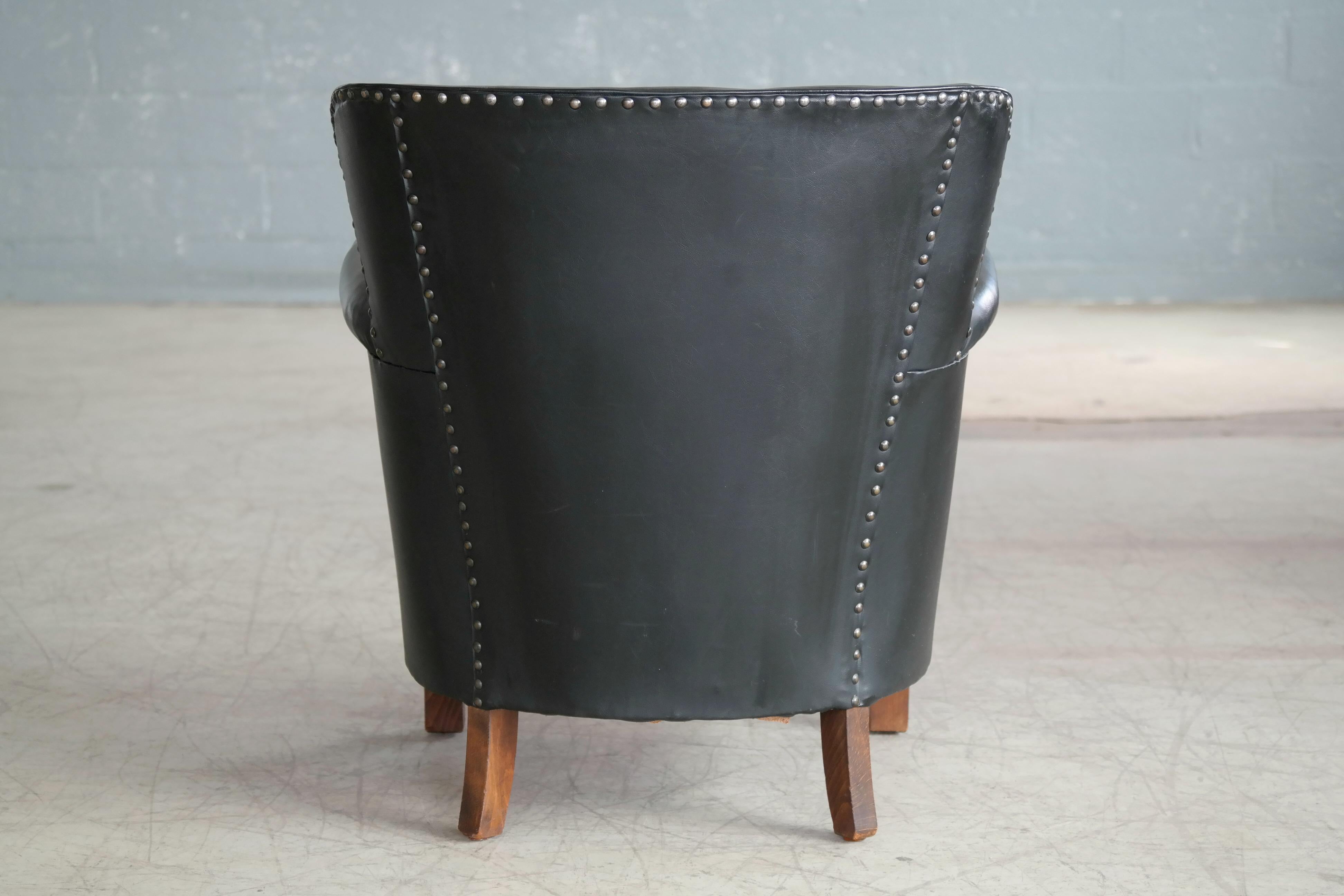 Danish 1930s Small Scale Club Chair in Patinated Black Leather and Studs In Good Condition In Bridgeport, CT