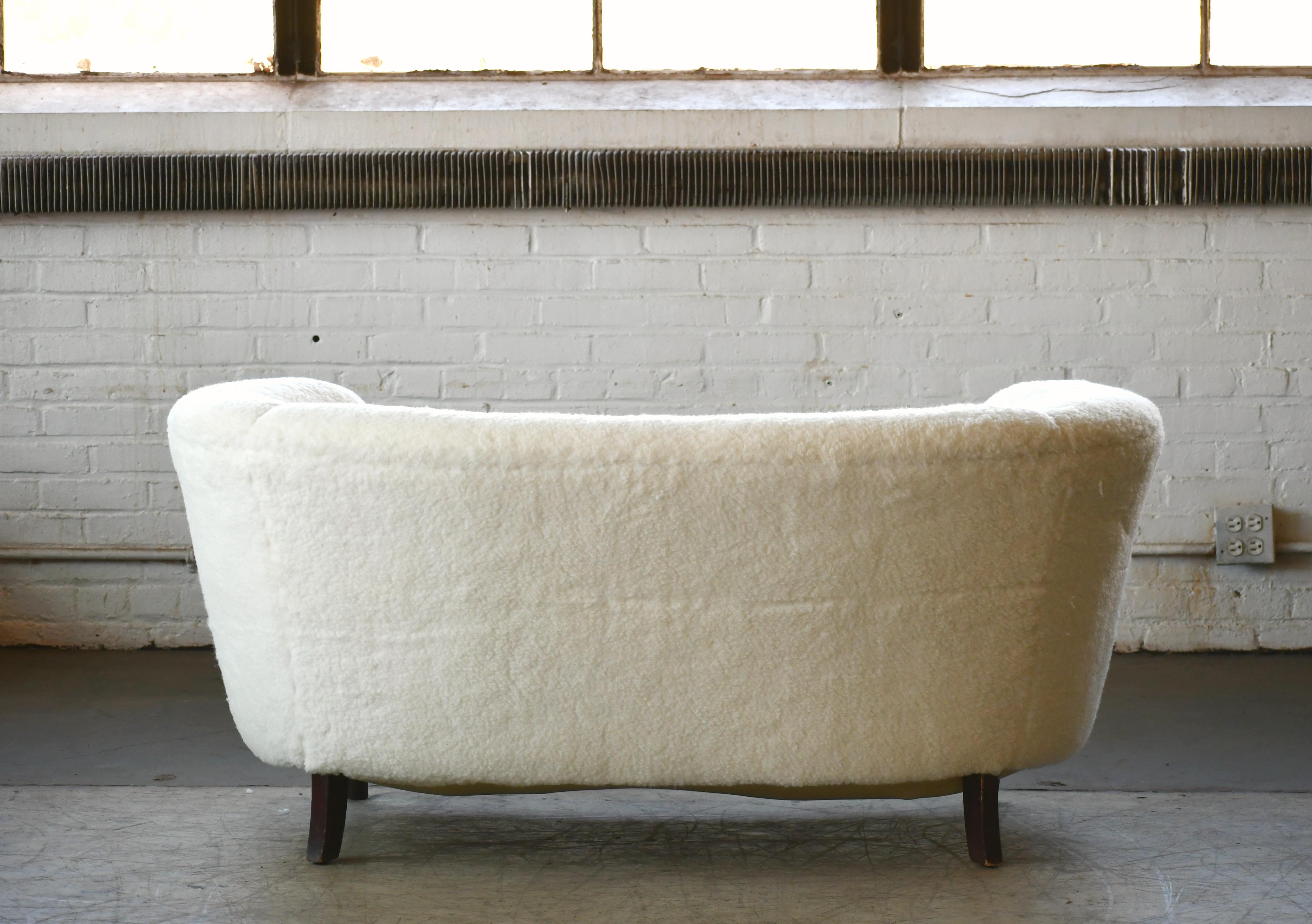 Mid-Century Modern Danish 1940s Banana Shaped Curved Loveseat Covered in Lambswool