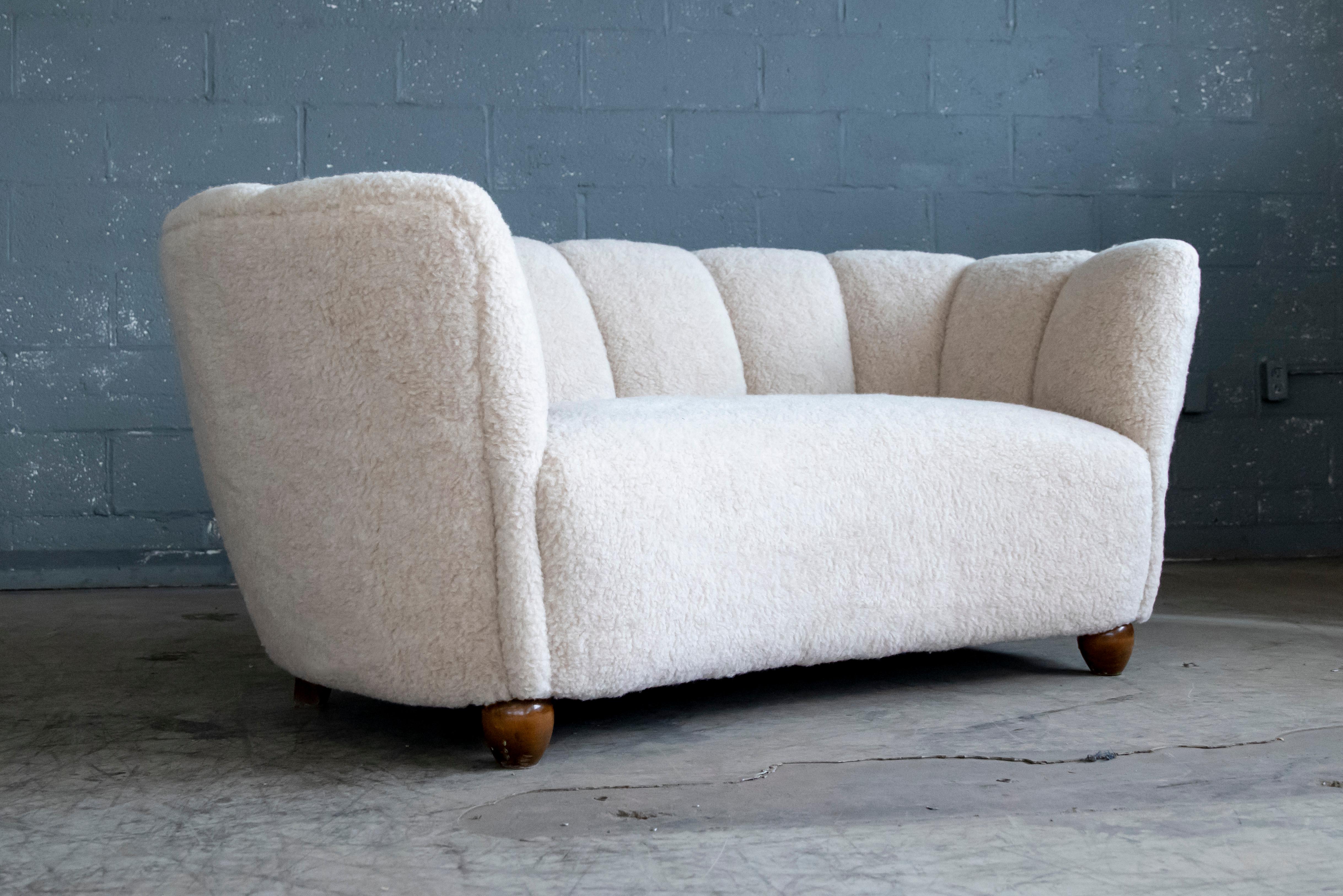 Mid-Century Modern Danish 1940's Banana Shaped Curved Loveseat or Sofa Covered in Beige Lambswool