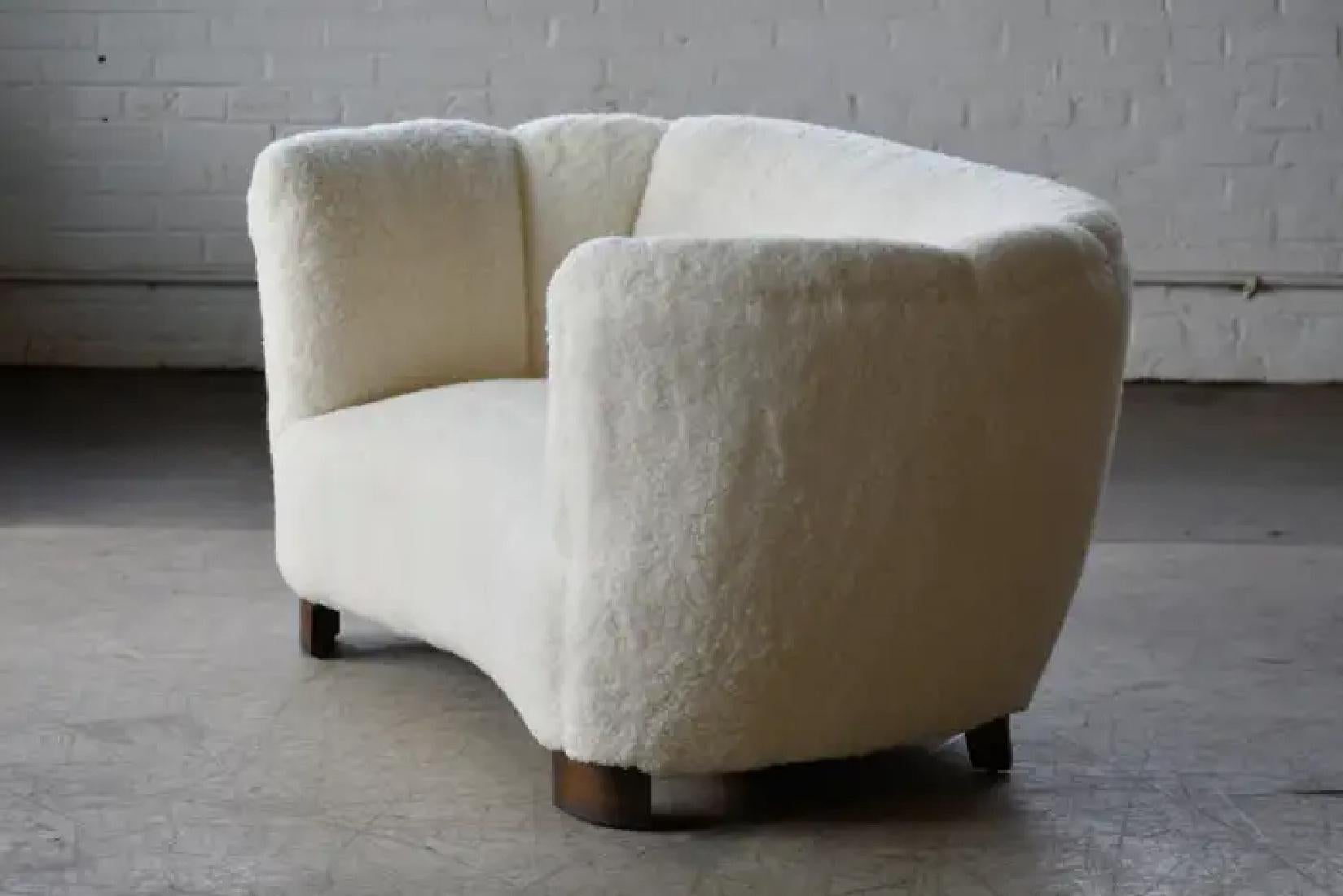 Mid-Century Modern Danish 1940's Banana Shaped Curved Loveseat or Sofa Covered in Lambswool For Sale