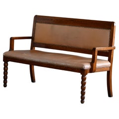 Danish 1940's Bench in Carved Oak and Tan Leather