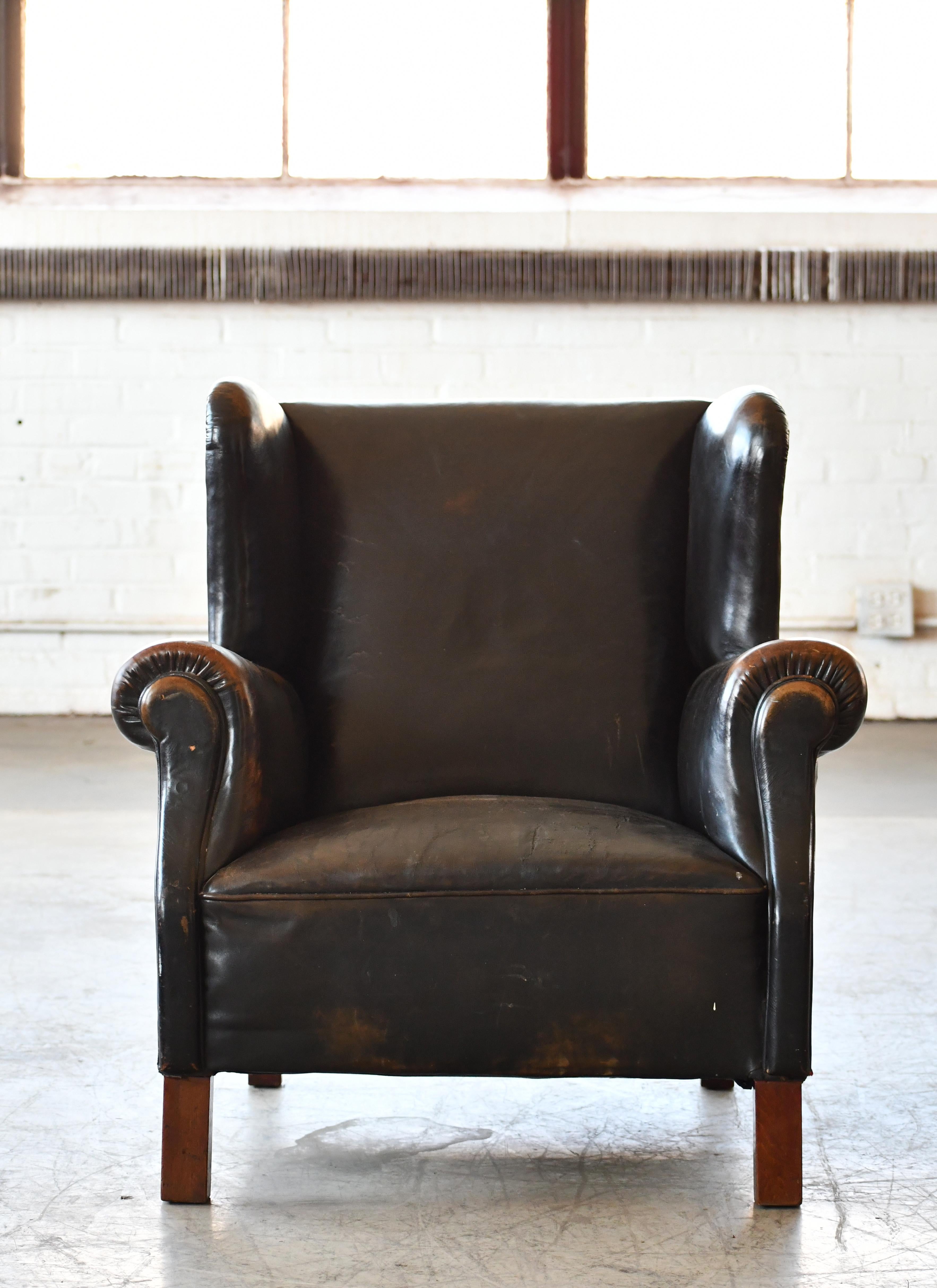 Danish 1940's Black Leather Large Wingback Lounge Chair with Patina In Good Condition In Bridgeport, CT