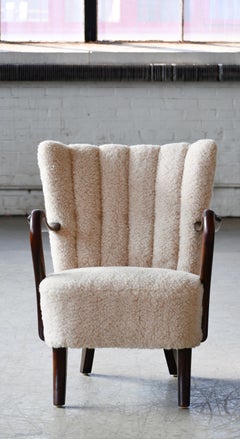 Danish 1940s Easy Chair in Lambswool with Open Armrests and Channel Back