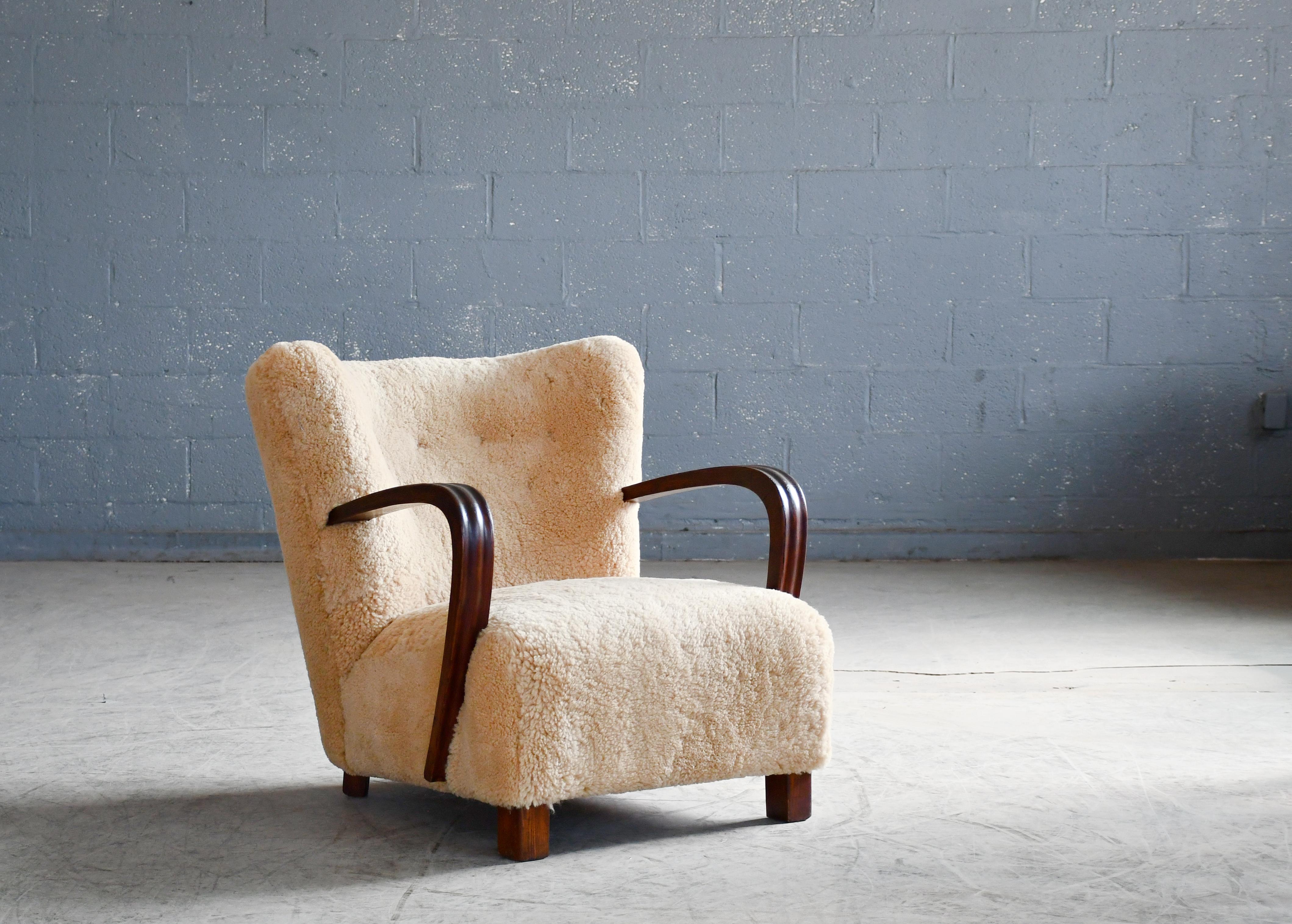 Danish 1940's Easy Lounge Chair with Amber Shearling and Wooden Armrests In Good Condition For Sale In Bridgeport, CT