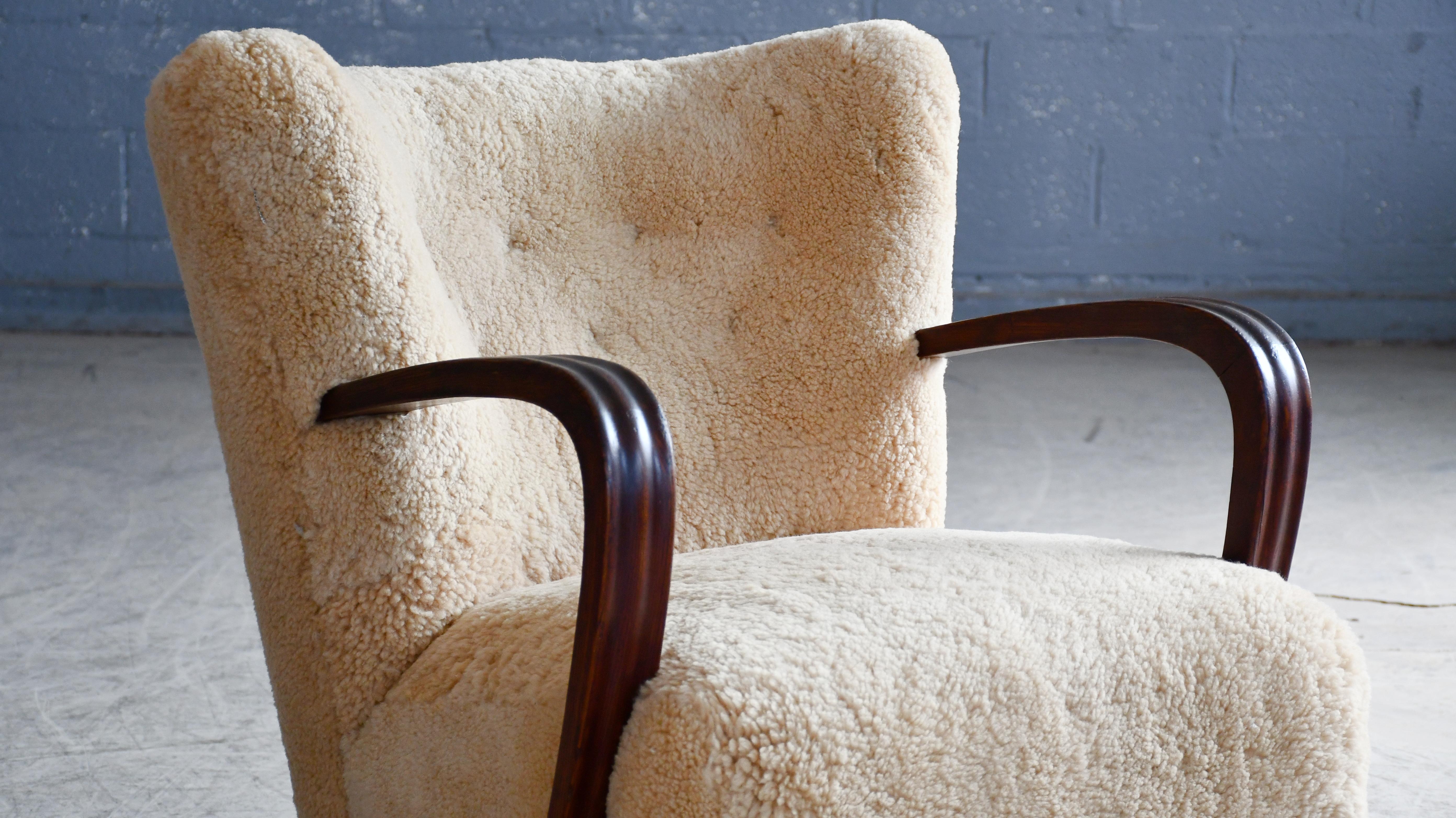 Mid-20th Century Danish 1940's Easy Lounge Chair with Amber Shearling and Wooden Armrests For Sale
