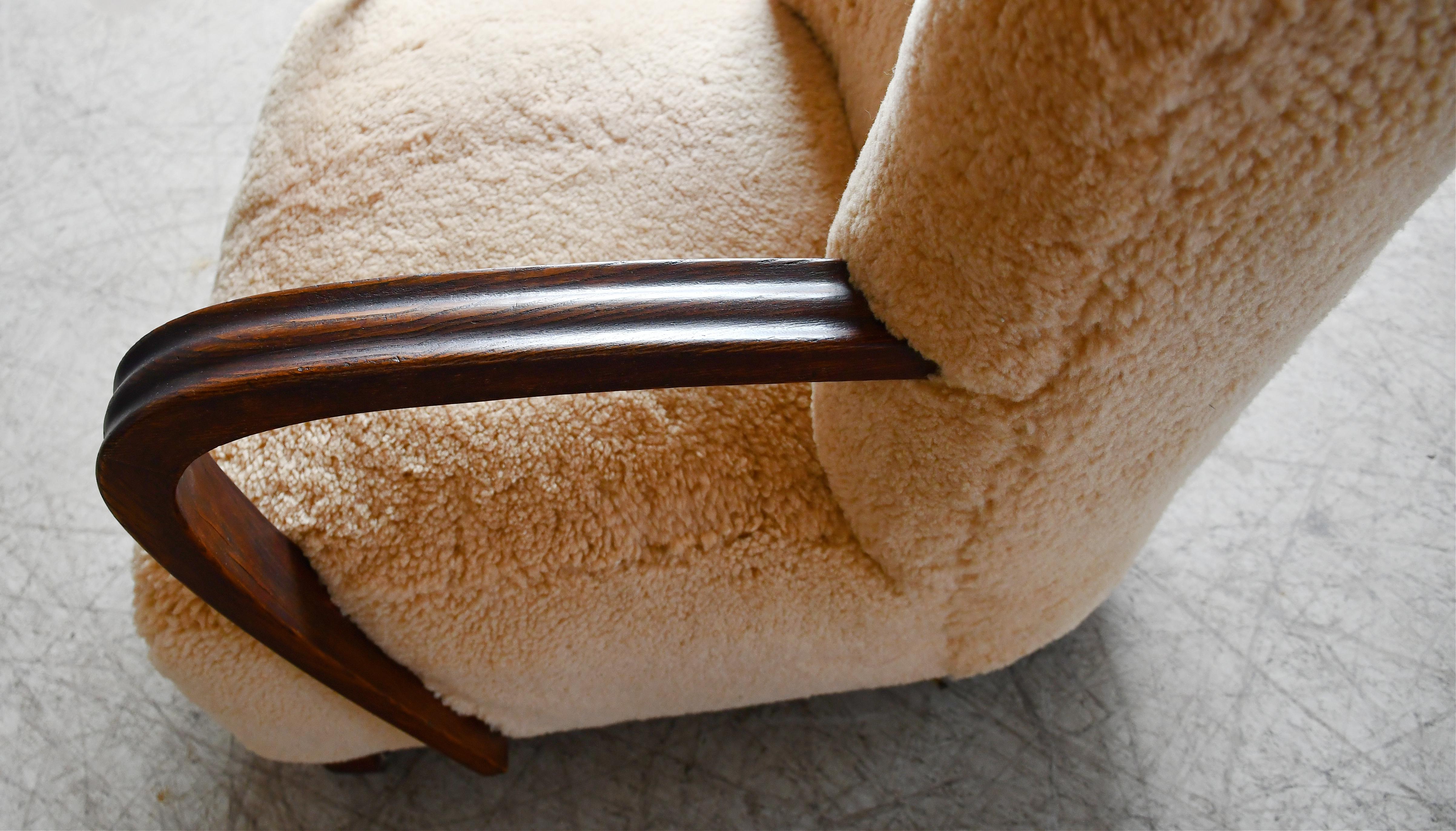 Sheepskin Danish 1940's Easy Lounge Chair with Amber Shearling and Wooden Armrests For Sale