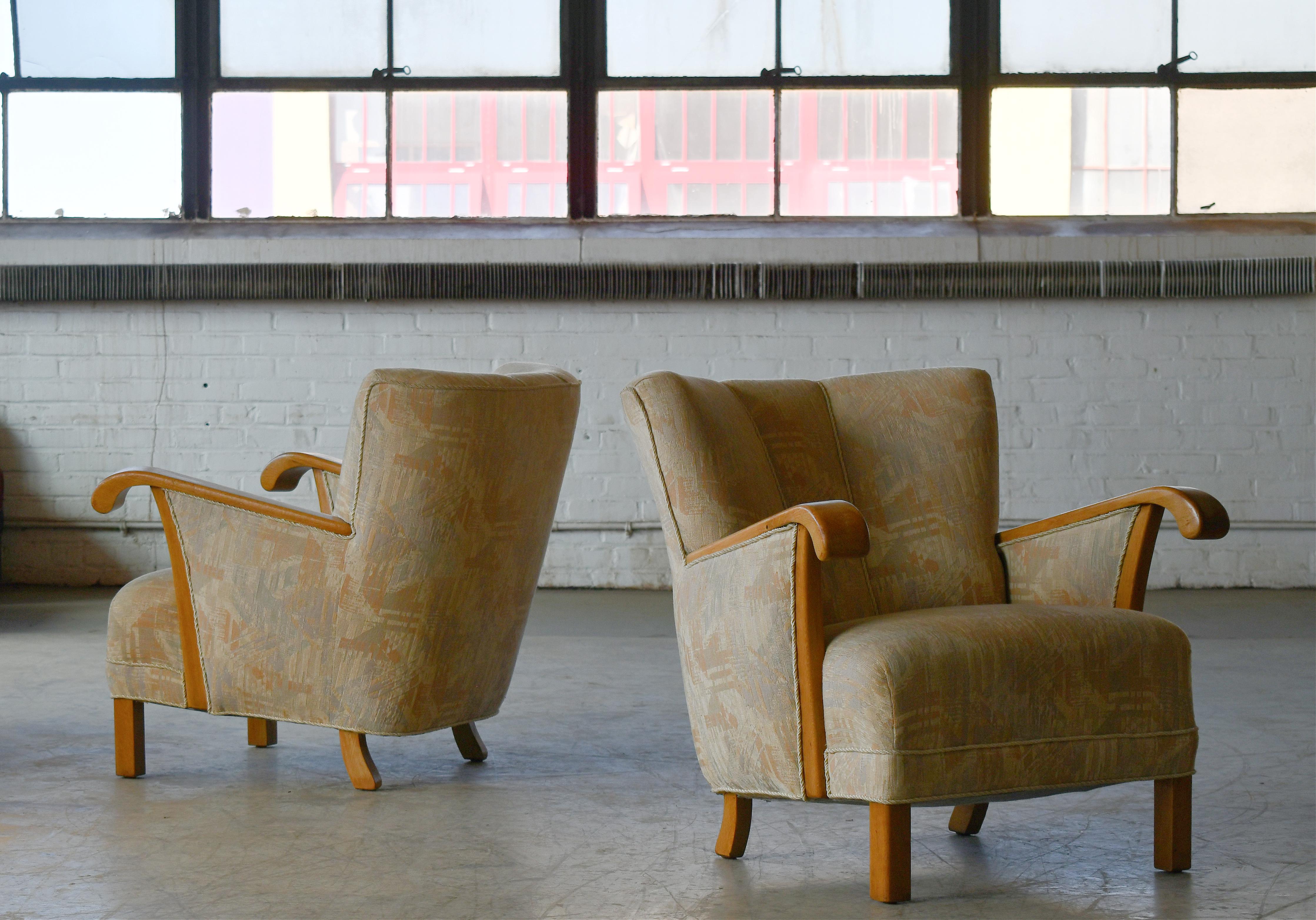 Pair of elegant  easy chairs from the late 1940s very typical of Fritz Hansen's design style both in terms of legs and armrests leading many dealers in Denmark to believe the chairs are indeed by Fritz Hansen. But nobody knows for sure. These type