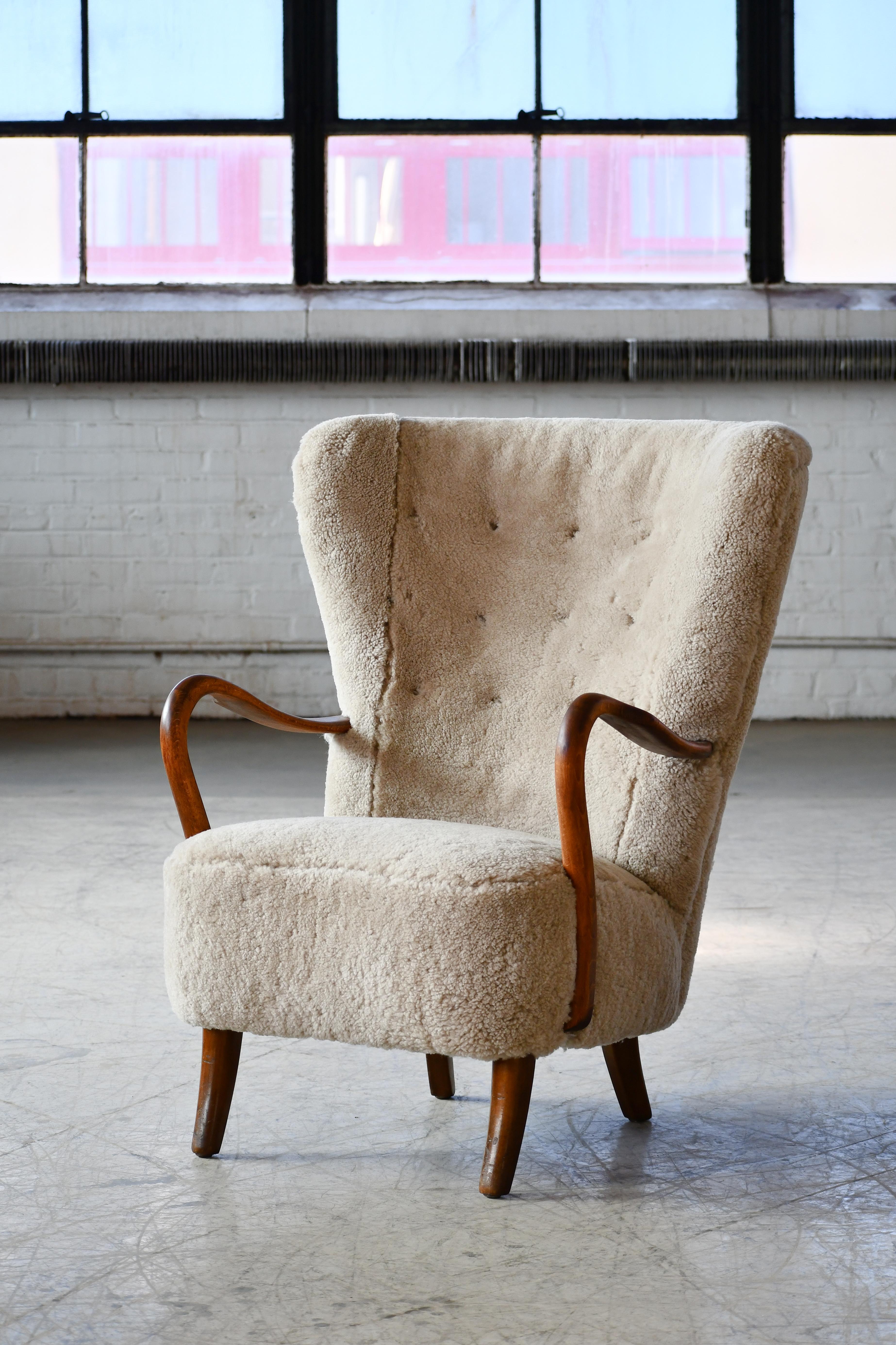 Mid-Century Modern Danish 1940s Highback Lounge Chair in Grey Sheepskin and Open Armrests in Oak