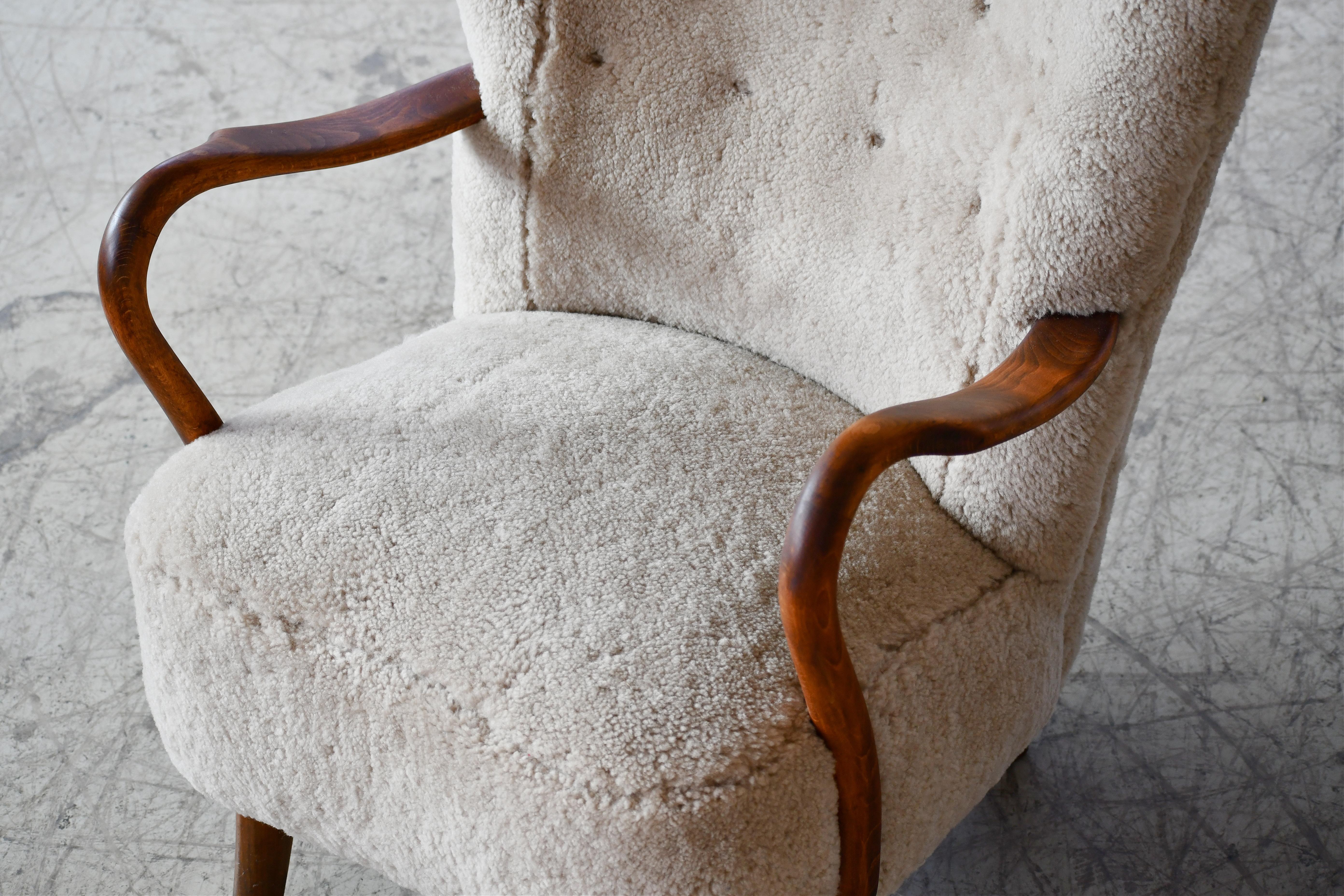 Mid-20th Century Danish 1940s Highback Lounge Chair in Grey Sheepskin and Open Armrests in Oak