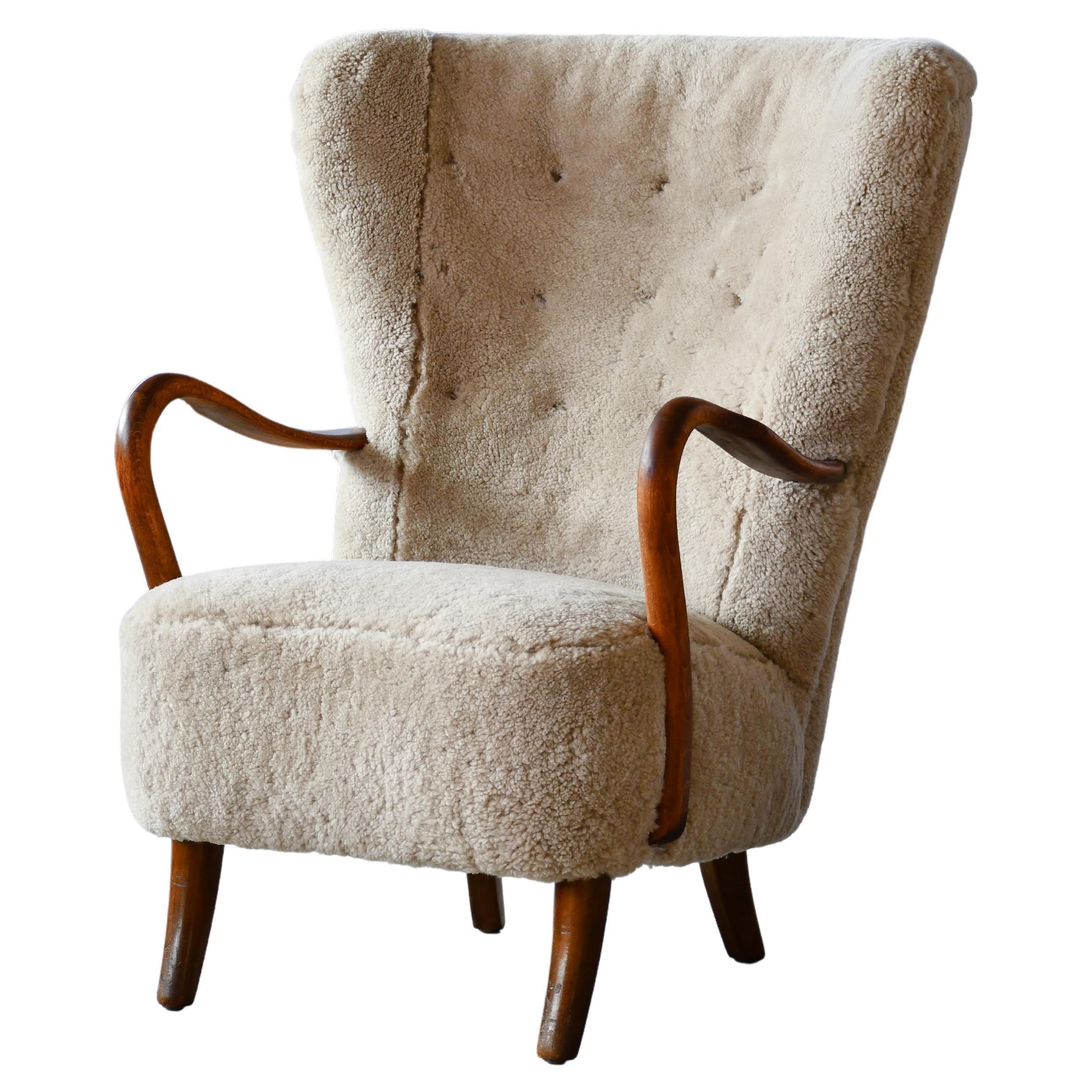 Danish 1940s Highback Lounge Chair in Grey Sheepskin and Open Armrests in Oak