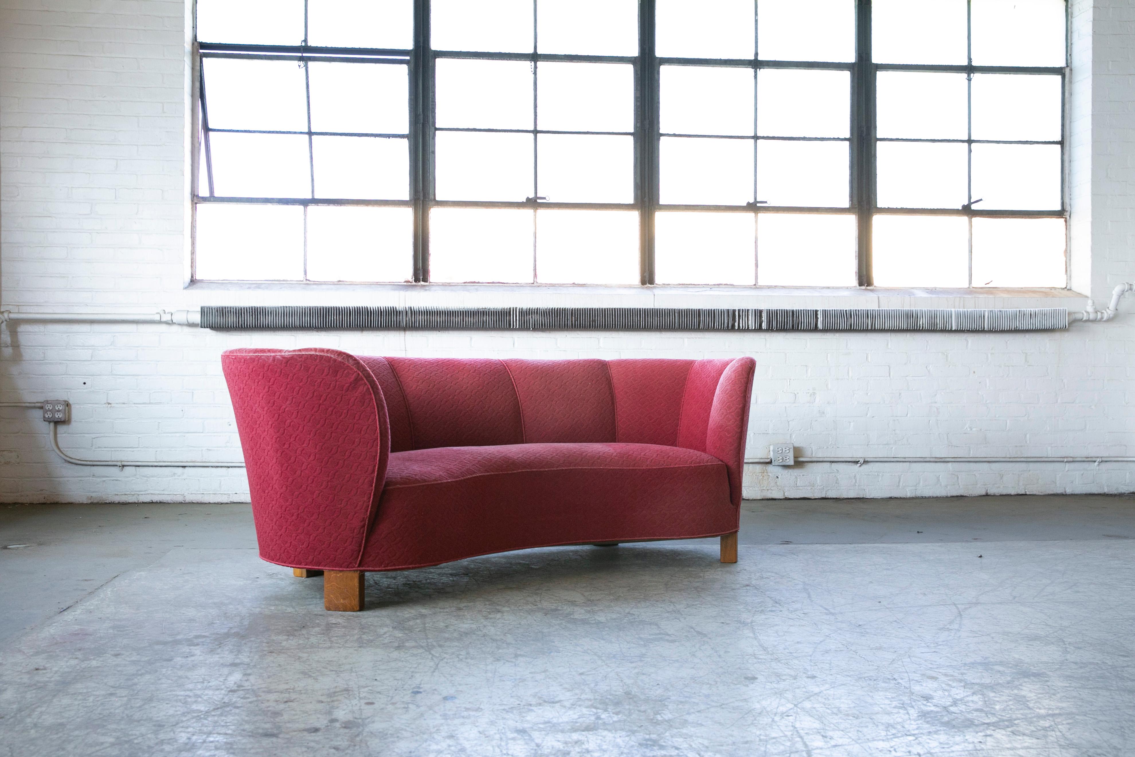 red curved sofa